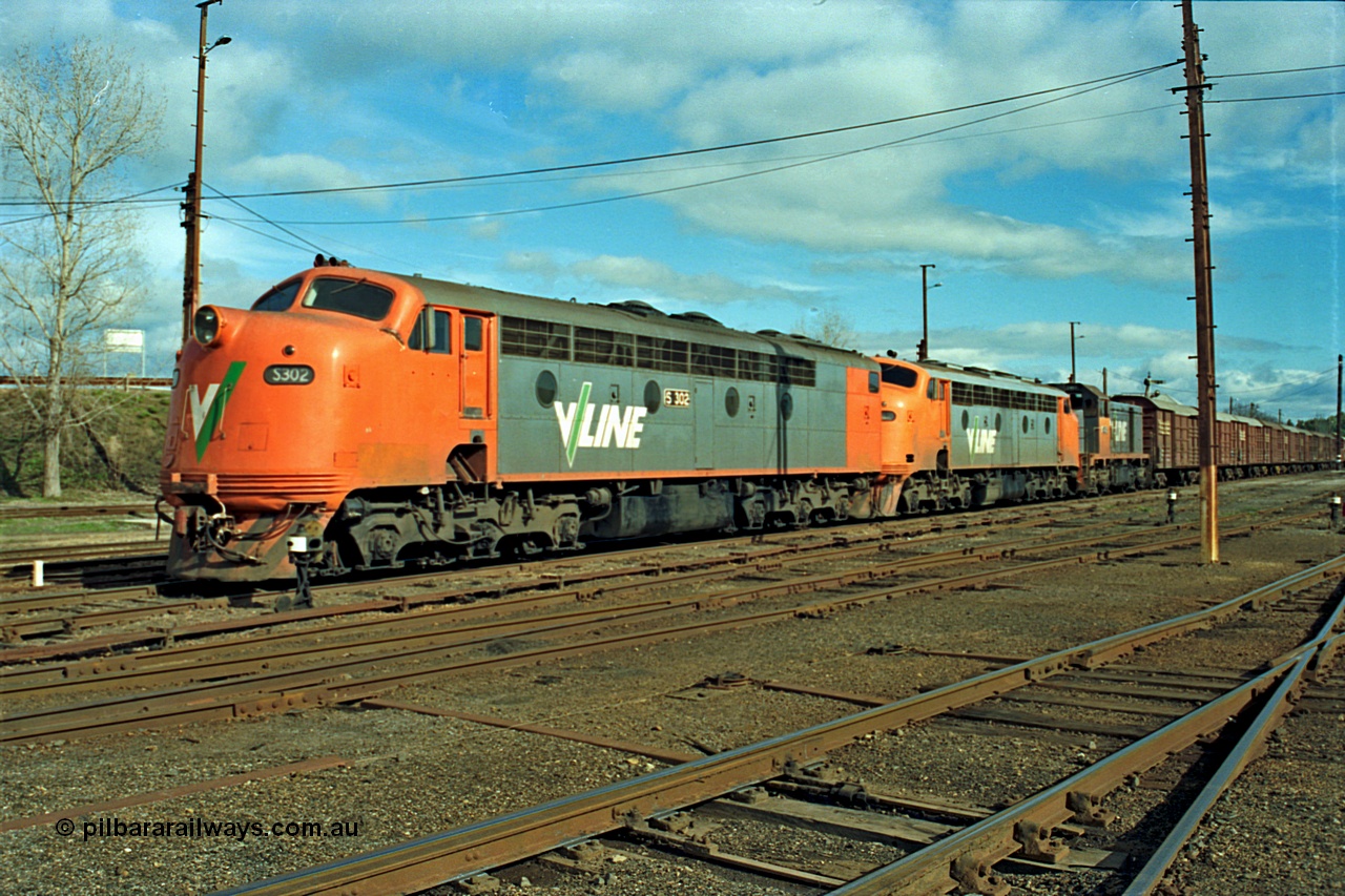 110-11
Benalla yard overview, broad gauge V/Line S class S 302 'Edward Henty' Clyde Engineering EMD model A7 serial 57-166, B class B 64 Clyde Engineering EMD model ML2 serial ML2-5 and V/Line T class loco T 403 with serial 67-498 a Clyde Engineering Granville NSW built EMD model G18B with stabled down Wodonga goods train 9303, point indicators.
Keywords: S-class;S302;Clyde-Engineering-Granville-NSW;EMD;A7;57-166;bulldog;B-class;B64;ML2;ML2-5;T-class;T403;G18B;67-498;