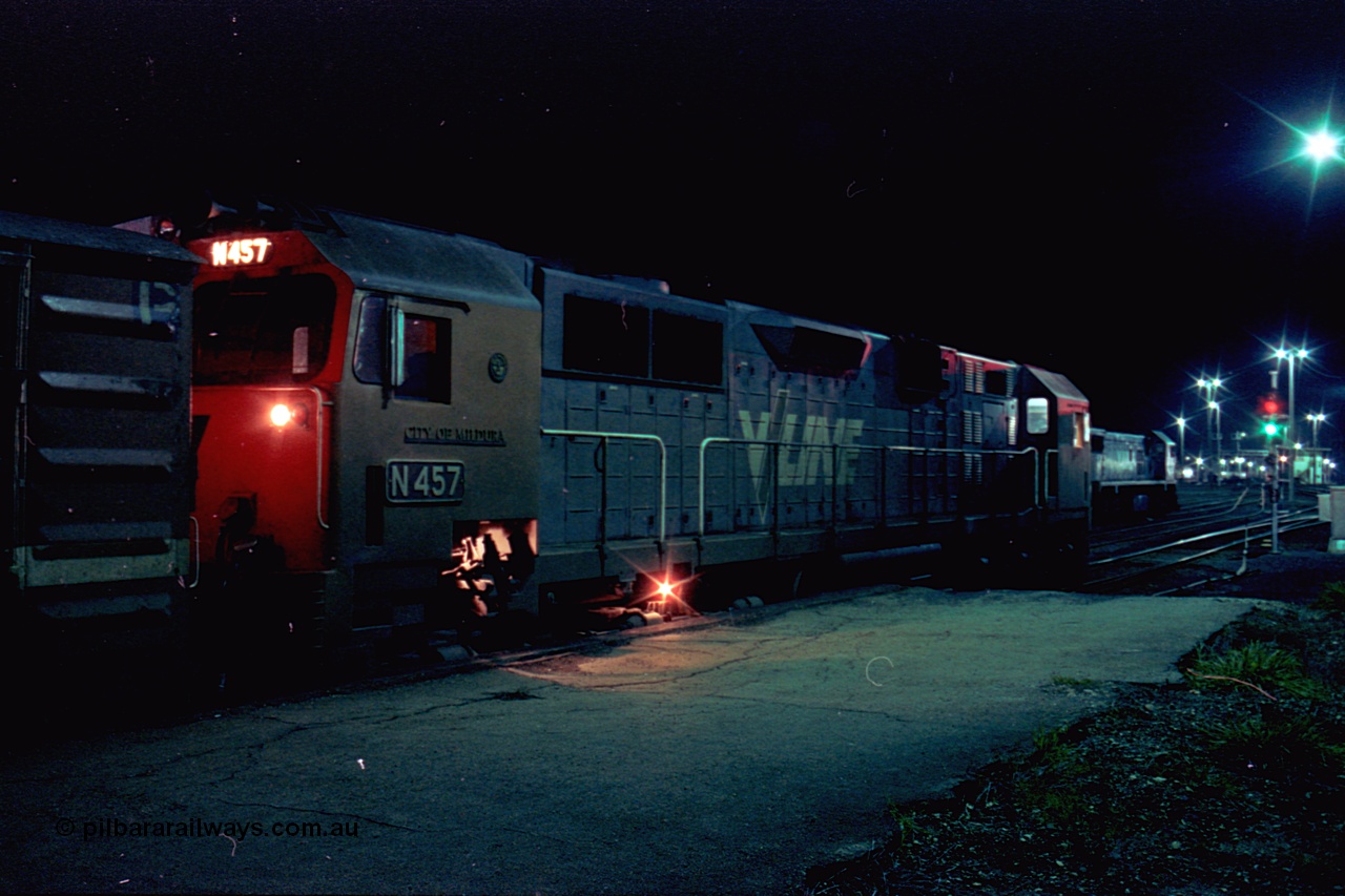110-30
Seymour station platform two, V/Line broad gauge N class N 457 'City of Mildura' Clyde Engineering EMD model JT22HC-2 serial 85-1225 leads the combined Albury - Cobram passenger train 8343, which splits here, looking north down Seymour yard, X class on stabled grain train.
Keywords: N-class;N457;Clyde-Engineering-Somerton-Victoria;EMD;JT22HC-2;85-1225;