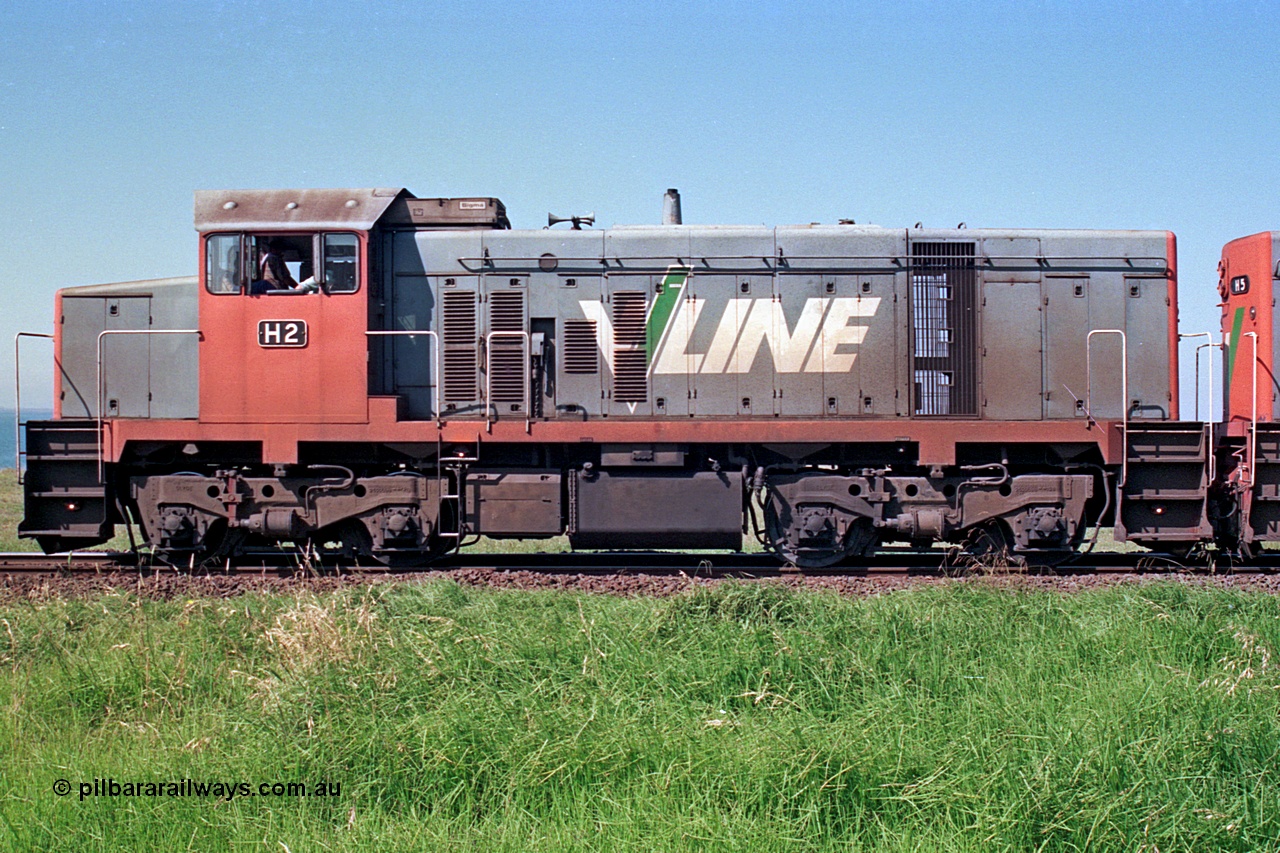 112-25
North Geelong grain loop, V/Line broad gauge H class H 2 Clyde Engineering EMD model G18B serial 68-630, LHS view coupled to sister H 5 serial 68-632, grain loop unloading operations.
Keywords: H-class;H2;Clyde-Engineering-Granville-NSW;EMD;G18B;68-630;H5;68-632;