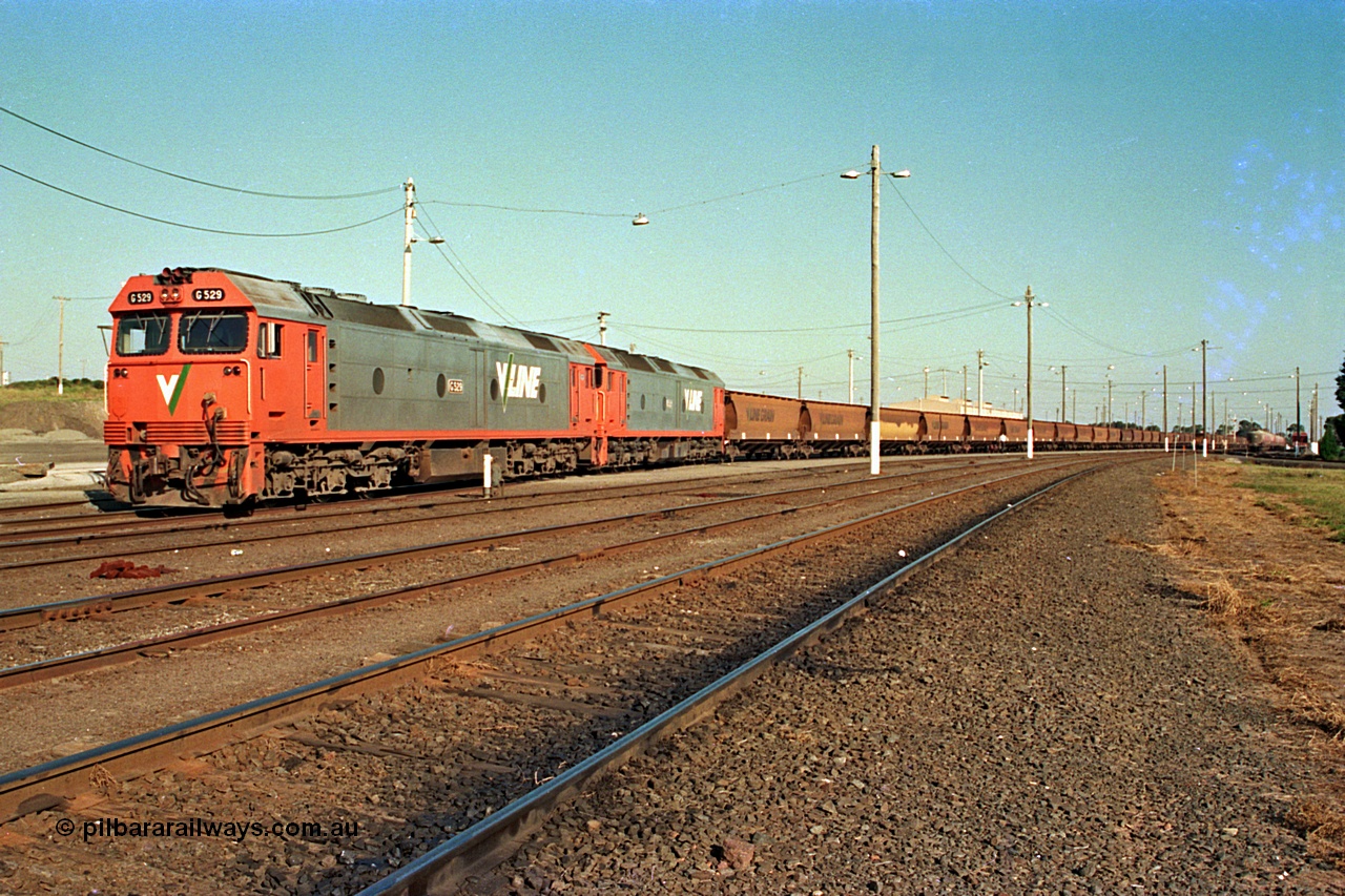 112-36
North Geelong yard view, V/Line broad gauge G class G 529 Clyde Engineering EMD model JT26C-2SS serial 88-1259 and another G class with an empty grain train waiting for departure time.
Keywords: G-class;G529;Clyde-Engineering-Somerton-Victoria;EMD;JT26C-2SS;88-1259;