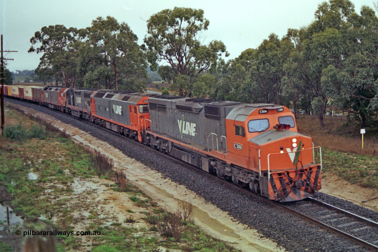 113-13
Near Gordon at Portland Flat road bridge, V/Line broad gauge up Adelaide goods train 9150 behind the quad CGCG combo of C class C 506 Clyde Engineering EMD model GT26C serial 76-829, G classes G 538 Clyde Engineering EMD model JT26C-2SS serial 89-1271, C 510 serial 76-833 and G 513 serial 85-1241, in miserable conditions, poor quality.
Keywords: C-class;C506;Clyde-Engineering-Rosewater-SA;EMD;GT26C;76-829;