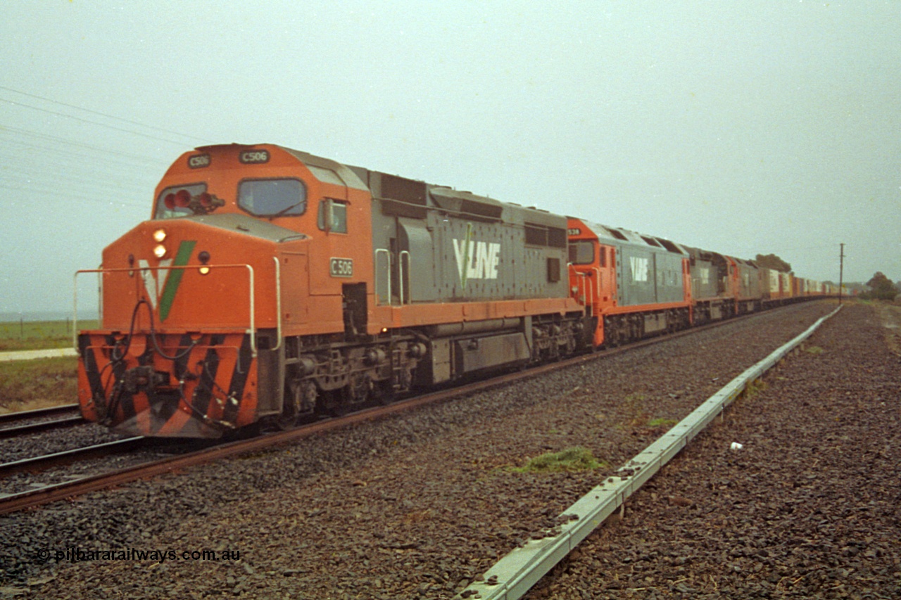 113-15
Bank Box Loop, V/Line broad gauge up Adelaide goods train 9150 behind the quad CGCG combo of C class C 506 Clyde Engineering EMD model GT26C serial 76-829, G class G 538 Clyde Engineering EMD model JT26C-2SS serial 89-1271, C 510 serial 76-833 and G 513 serial 85-1241, in miserable conditions, poor quality, trailing view.
Keywords: C-class;C506;Clyde-Engineering-Rosewater-SA;EMD;GT26C;76-829;
