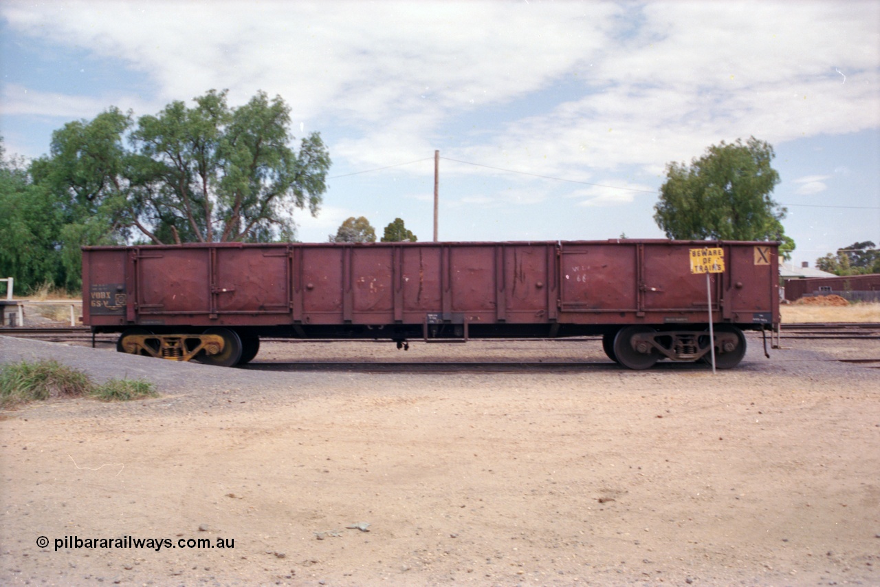 118-06
Strathmerton yard, V/Line broad gauge VOBX type bogie open waggon VOBX 68, side shot, built by Victorian Railways Newport Workshops as ELF type 1963, to ELX 1965, then VOBX in 1979 and to ROBX in 1994.
Keywords: VOBX-type;VOBX68;Victorian-Railways-Newport-WS;ELF-type;ELX-type;ROBX-type;