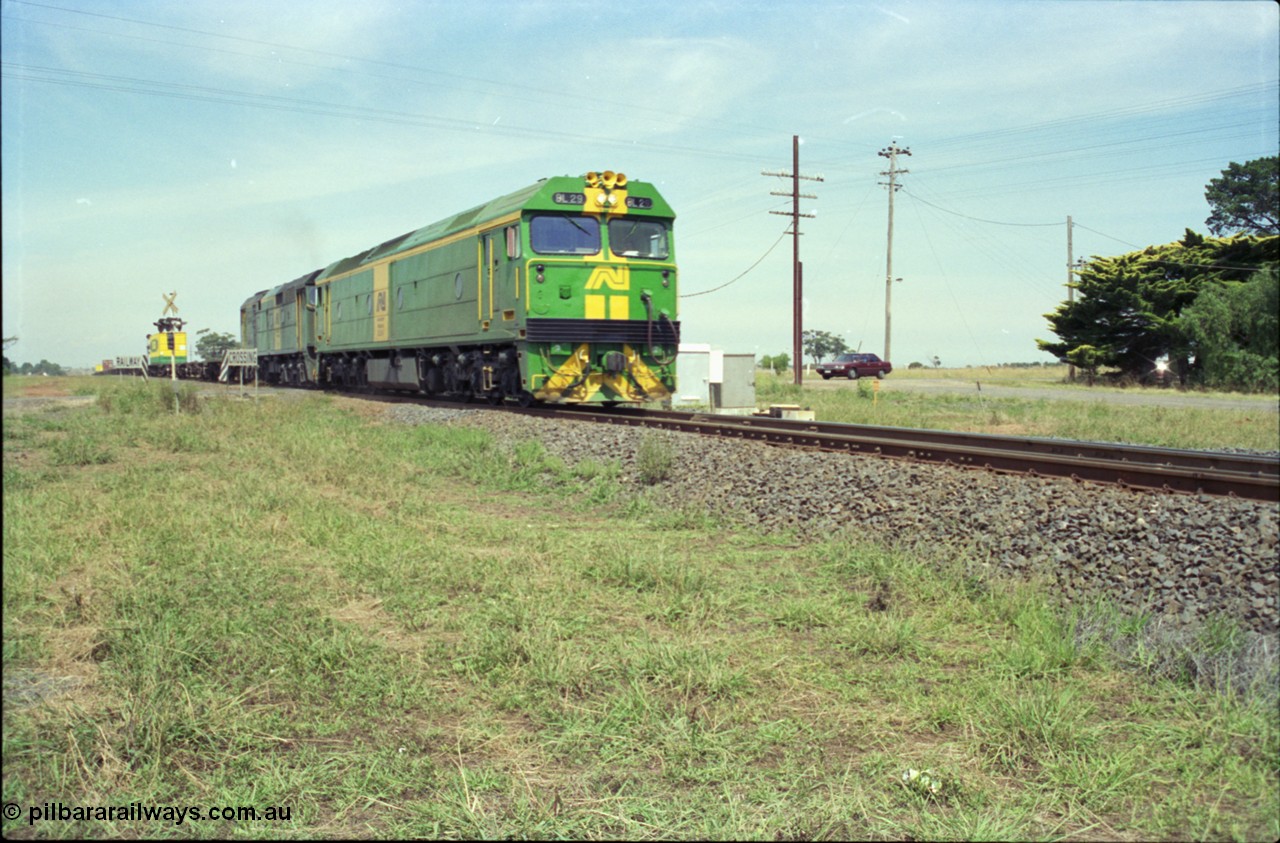 119-26
Rockbank Australian National broad gauge locos BL class BL 29 Clyde Engineering EMD model JT26C-2SS serial 83-1013 and 700 class 703 AE Goodwin ALCo model DL500G serial G6059-1 working down Adelaide goods train 9145 crossing.
Keywords: BL-class;BL29;Clyde-Engineering-Rosewater-SA;EMD;JT26C-2SS;83-1013;