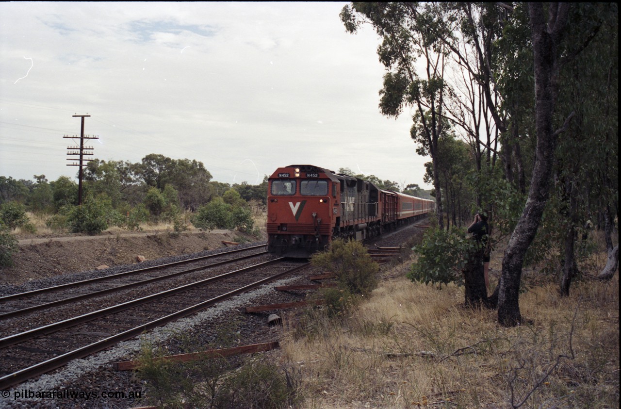 120-16
Seymour, V/Line broad gauge loco N class N 452 'Rural City of Wodonga' Clyde Engineering EMD model JT22HC-2 serial 85-1220, up Albury passenger train, north of Seymour, new sleepers on line.
Keywords: N-class;N452;Clyde-Engineering-Somerton-Victoria;EMD;JT22HC-2;85-1220;