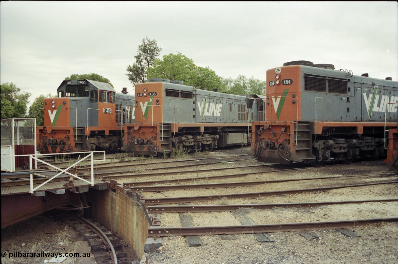 120-36
Wodonga loco depot turntable, pit, radial roads, V/Line broad gauge locos T class T 402 Clyde Engineering EMD model G18B serial 67-497, X class X 36 Clyde Engineering EMD model G16C serial 66-489, X class X 54 Clyde Engineering EMD model G26C serial 75-801, the differences between to the X class units are evident.
Keywords: X-class;X36;Clyde-Engineering-Granville-NSW;EMD;G16C;66-489;