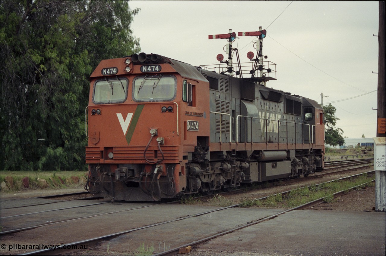 120-37
Wodonga, V/Line broad gauge loco N class N 474 'City of Traralgon' Clyde Engineering EMD model JT22HC-2 serial 87-1203, stabled near A Signal Box, under semaphore signal post 19.
Keywords: N-class;N474;Clyde-Engineering-Somerton-Victoria;EMD;JT22HC-2;87-1203;