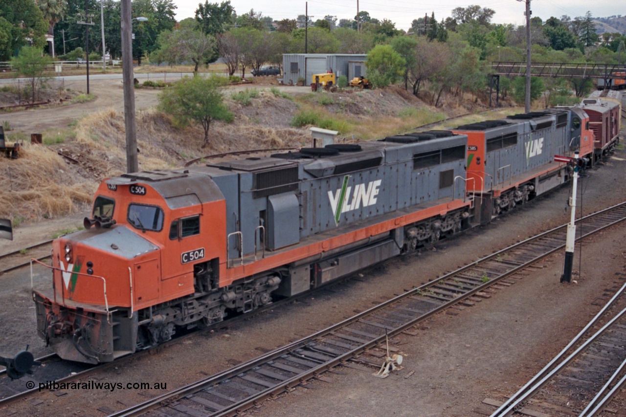121-07
Albury loco depot, V/Line standard gauge C classes C 504 Clyde Engineering EMD model GT26C serial 76-827 and C 505 Clyde Engineering EMD model GT26C serial 76-828, elevated 3/4 view.
Keywords: C-class;C504;Clyde-Engineering-Rosewater-SA;EMD;GT26C;76-827;