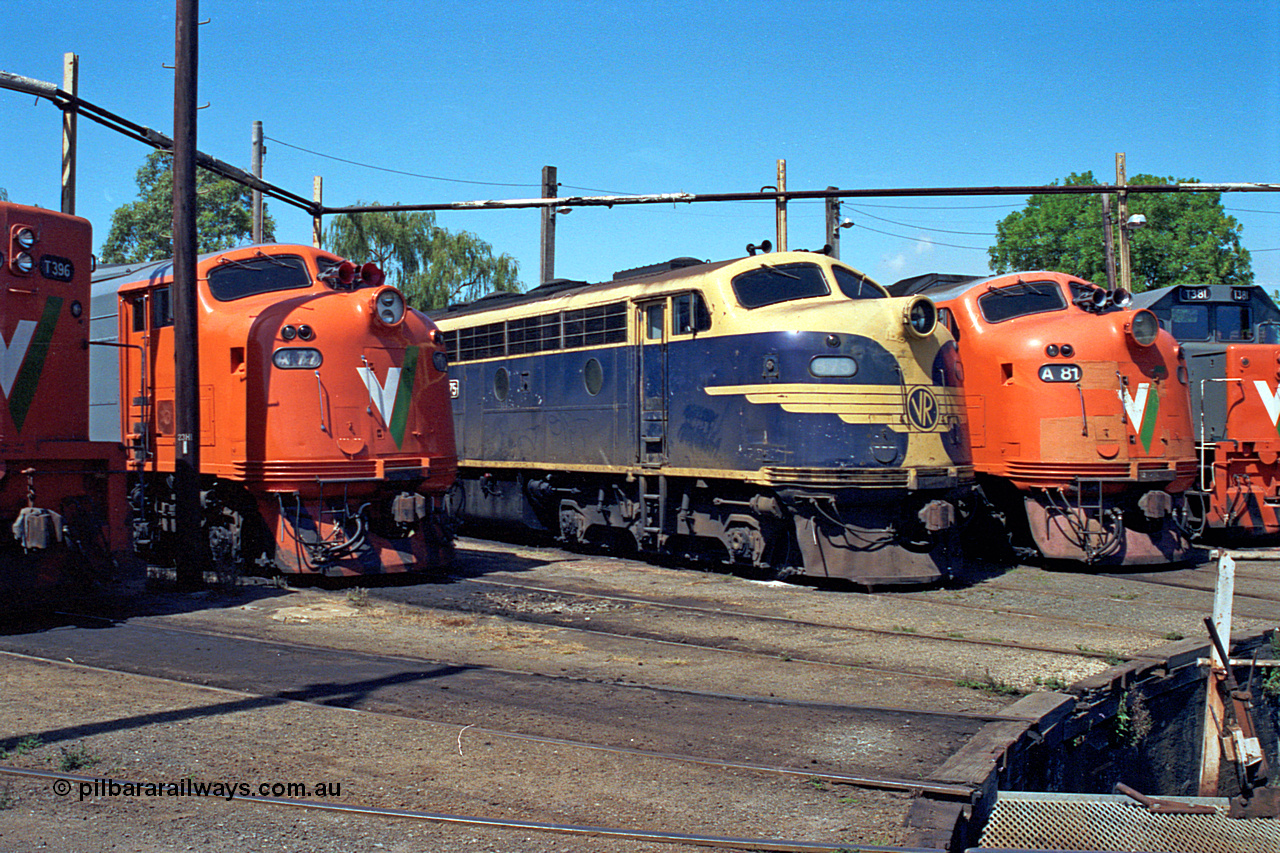 122-11
Traralgon loco depot, turntable roads, V/Line broad gauge locos: A class A 77 Clyde Engineering EMD model AAT22C-2R serial 83-1181 rebuilt from B class B 77 Clyde Engineering EMD model ML2 serial ML2-18, B class B 75 serial ML2-16 still in VR livery, A class A 81 serial 85-1189 rebuilt from B class B 81 serial ML2-22.
Keywords: B-class;B75;Clyde-Engineering-Granville-NSW;EMD;ML2;ML2-16;bulldog;