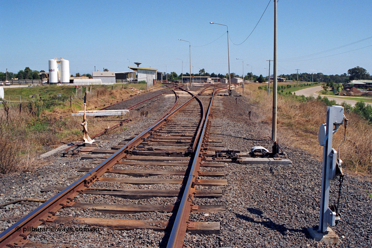 122-20
Sale station yard overview, looking from Bairnsdale end of yard, station in middle background on right, points, lever and interlocking.
