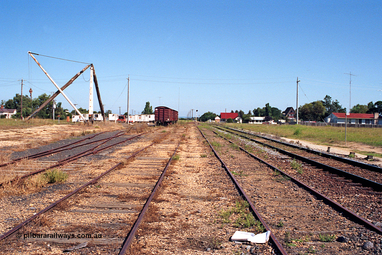 122-24
Stratford, station yard overview, looking towards Stratford Junction, 222 km post, yard crane, workman's camp.
