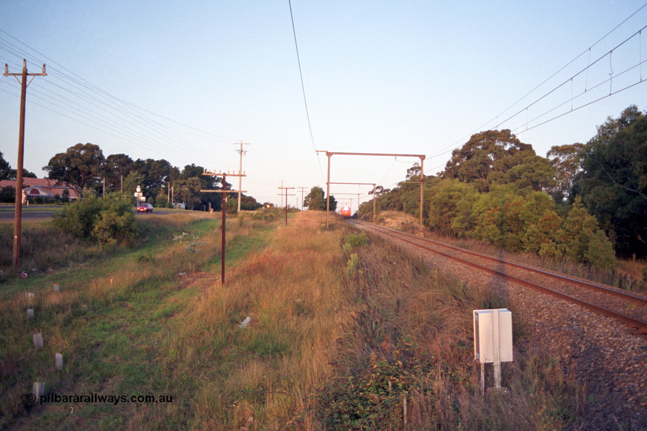123-1-21
Traralgon, Coonoc Rd, V/Line broad gauge N class N 451 'City of Portland' Clyde Engineering EMD model JT22HC-2 serial 85-1219, N set, up Bairnsdale pass, distant shot.
Keywords: N-class;N451;Clyde-Engineering-Somerton-Victoria;EMD;JT22HC-2;85-1219;