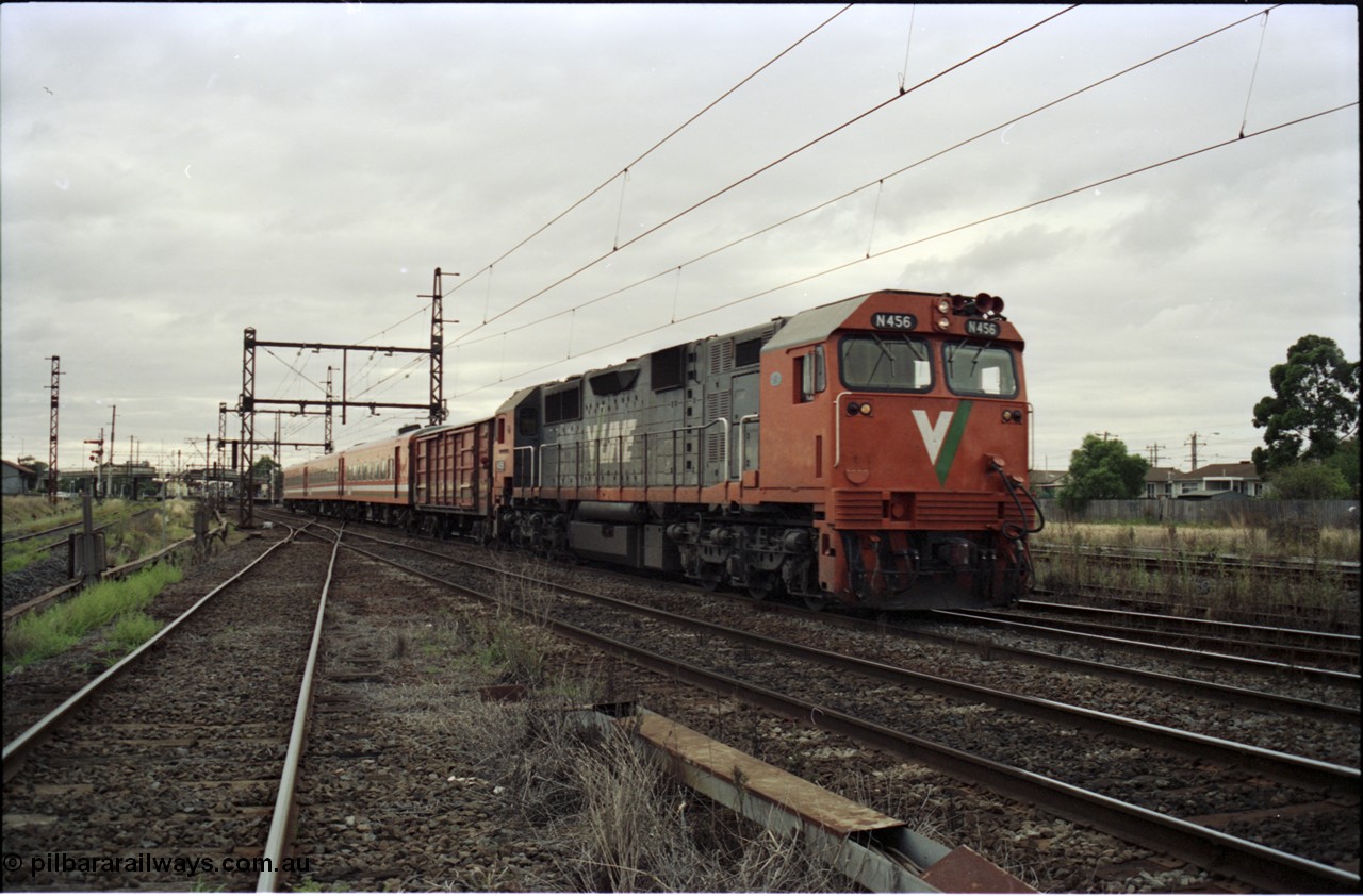 123-2-16
Sunshine broad gauge up passenger train with V/Line N class loco N 456 'City of Colac' with serial 85-1224 a Clyde Engineering Somerton Victoria built EMD model JT22HC-2 with D vans and N set.
Keywords: N-class;N456;Clyde-Engineering-Somerton-Victoria;EMD;JT22HC-2;85-1224;