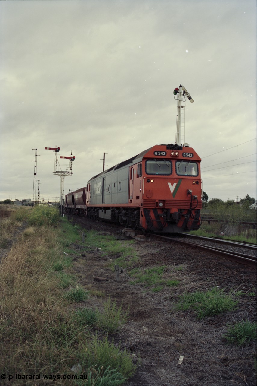 123-2-22
Sunshine track view, Newport - Sunshine Loop Line, looking towards Sunshine, double doll semaphore signal posts 36 and pulled off semaphore signal post 49 sort of frame V/Line broad gauge G class G 543, the last member of the class, Clyde Engineering EMD model JT26C-2SS serial 89-1276 with loaded up Apex quarry train bound for Brooklyn.
Keywords: G-class;G543;Clyde-Engineering-Somerton-Victoria;EMD;JT26C-2SS;89-1276;