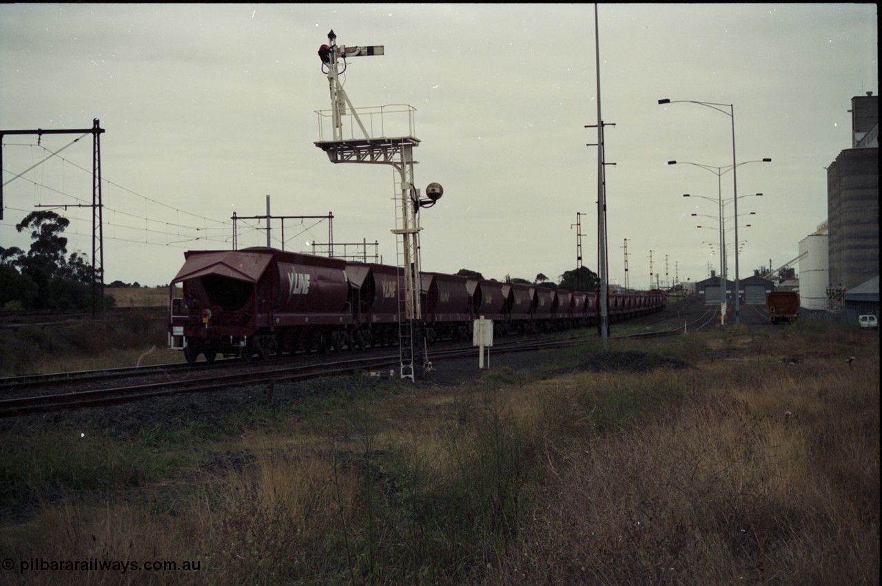 123-2-24
Sunshine track view, Newport - Sunshine Loop Line, looking towards Newport, GEB Sidings on the right, semaphore signal post 50 protecting down movements, V/Line broad gauge G class G 543, the last unit of Clyde Engineering EMD model JT26C-2SS serial 89-1276 with an loaded up Apex quarry train bound for Brooklyn, trailing shot.
Keywords: G-class;G543;Clyde-Engineering-Somerton-Victoria;EMD;JT26C-2SS;89-1276;