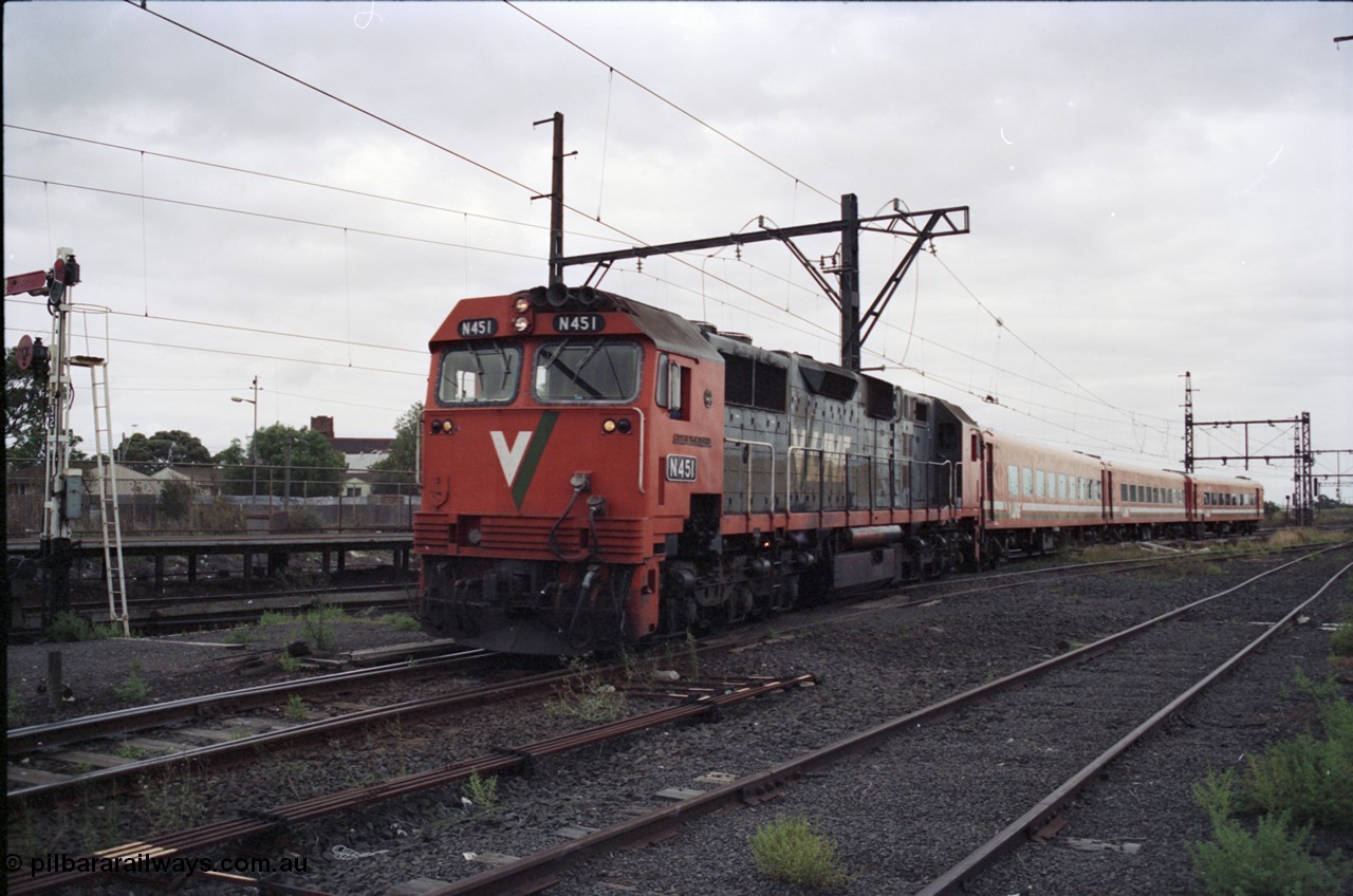 123-2-26
Sunshine V/Line broad gauge down Ballarat passenger train with N class leader N 451 'City of Portland' a Clyde Engineering EMD model JT22HC-2 serial 85-1219 and N set.
Keywords: N-class;N451;Clyde-Engineering-Somerton-Victoria;EMD;JT22HC-2;85-1219;
