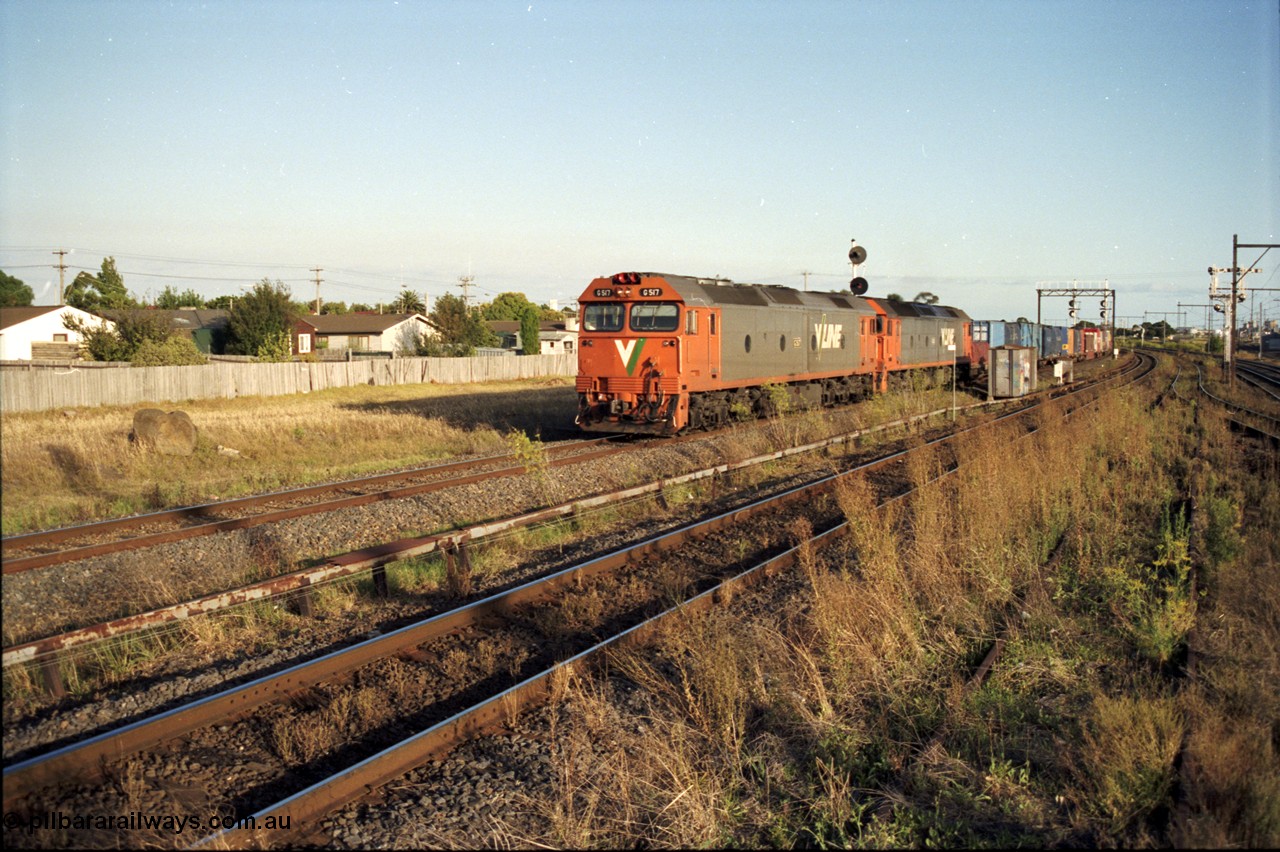 124-12
Sunshine Loop, V/Line standard gauge Sydney bound down goods train with G class G 517 Clyde Engineering EMD model JT26C-2SS serial 85-1230 and another G class
Keywords: G-class;G517;Clyde-Engineering-Rosewater-SA;EMD;JT26C-2SS;85-1230;