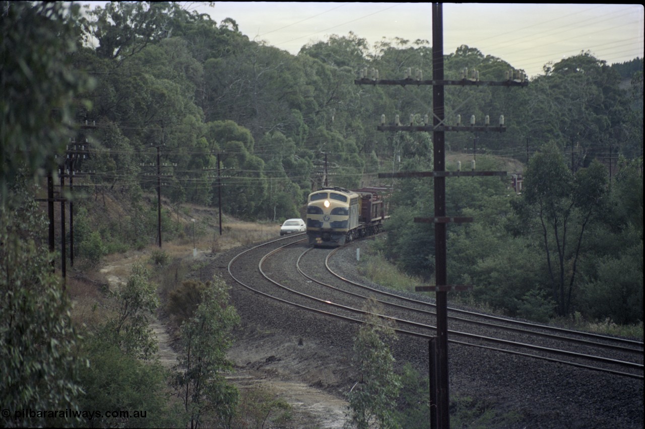 125-12
Kilmore East V/Line broad gauge B class 65 Clyde Engineering EMD model ML2 serial ML2-6 still in Victorian Railways livery leads a sleeper discharge train on the up broad gauge line.
Keywords: B-class;B65;Clyde-Engineering-Granville-NSW;EMD;ML2;ML2-6;bulldog;