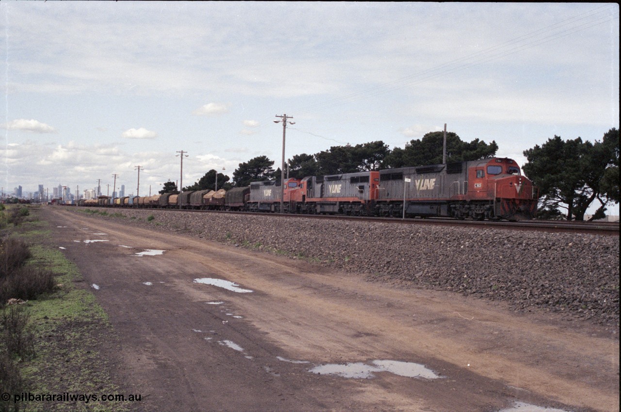 126-08
Tottenham broad gauge train 9169 down goods to Adelaide via Cressy, brake testing at Tottenham , V/Line C classes C 503 Clyde Engineering EMD model GT26C serial 76-826, C 506 serial 76-829 and C 501 'George Brown' serial 76-824, Melbourne skyline in background.
Keywords: C-class;C501;Clyde-Engineering-Rosewater-SA;EMD;GT26C;76-824;C506;76-826;C503;76-829;