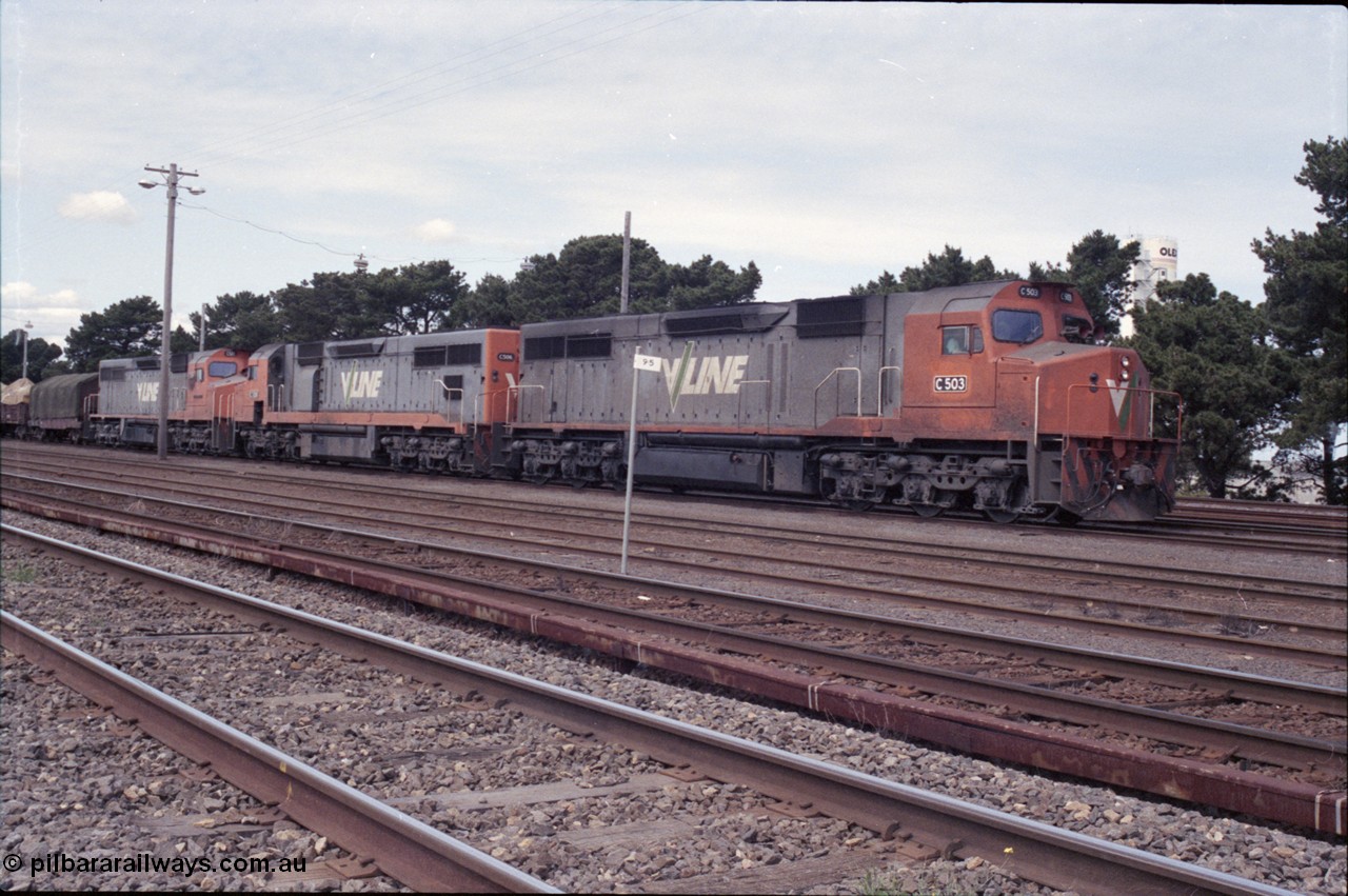 126-11
Tottenham broad gauge train 9169 down goods to Adelaide via Cressy, brake testing at Tottenham , V/Line C classes C 503 Clyde Engineering EMD model GT26C serial 76-826, C 506 serial 76-829 and C 501 'George Brown' serial 76-824. Olex Cables plant in background.
Keywords: C-class;C501;Clyde-Engineering-Rosewater-SA;EMD;GT26C;76-824;C506;76-826;C503;76-829;