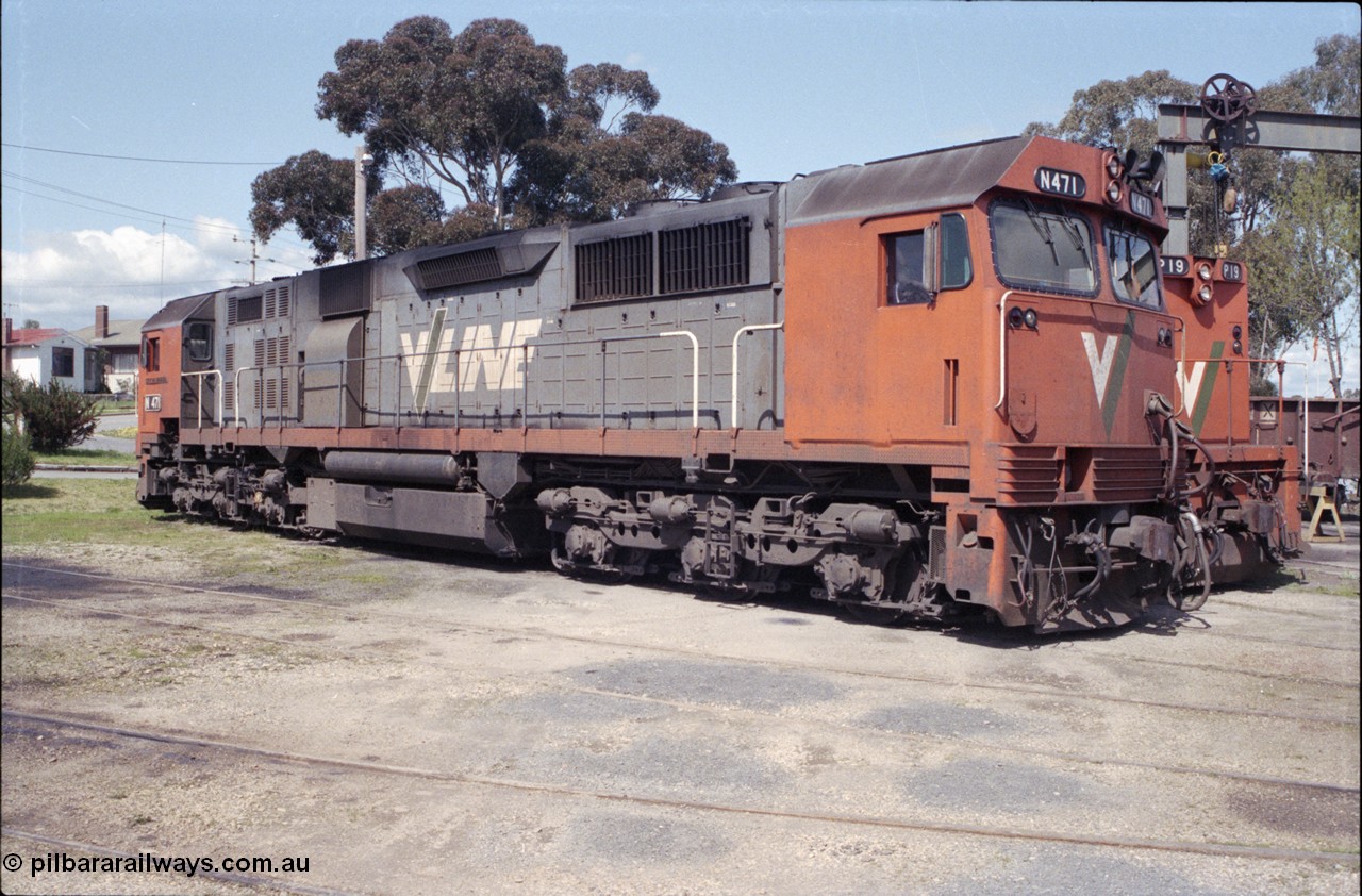 126-37
Seymour loco depot turntable roads, 3/4 view of V/Line broad gauge N class N 471 'City of Benalla' Clyde Engineering EMD model JT22HC-2 serial 87-1200.
Keywords: N-class;N471;Clyde-Engineering-Somerton-Victoria;EMD;JT22HC-2;87-1200;