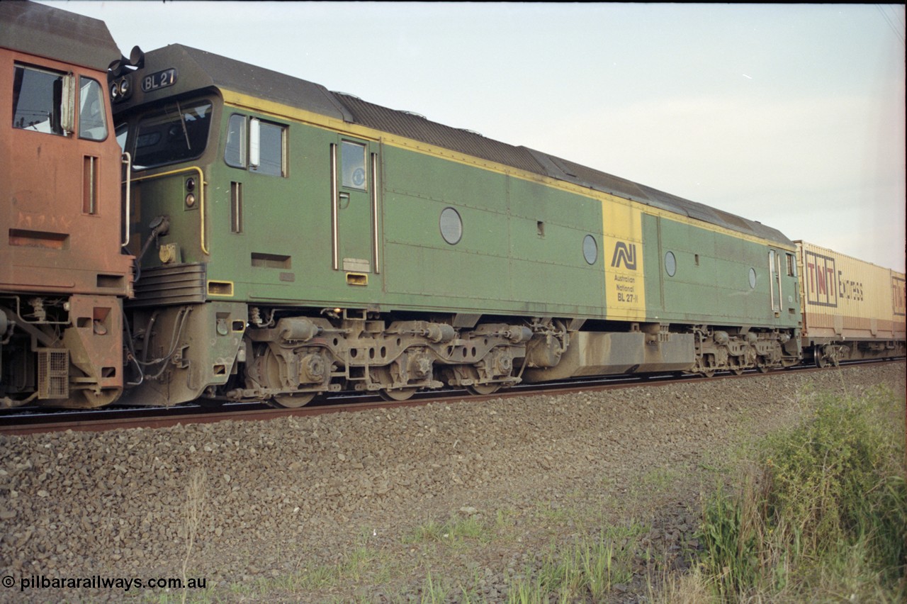 127-25
Deer Park West, broad gauge Australian National BL class BL 27 Clyde Engineering EMD model JT26C-2SS serial 83-1011, trailing unit on a down Adelaide goods train.
Keywords: BL-class;BL27;Clyde-Engineering-Rosewater-SA;EMD;JT26C-2SS;83-1011;