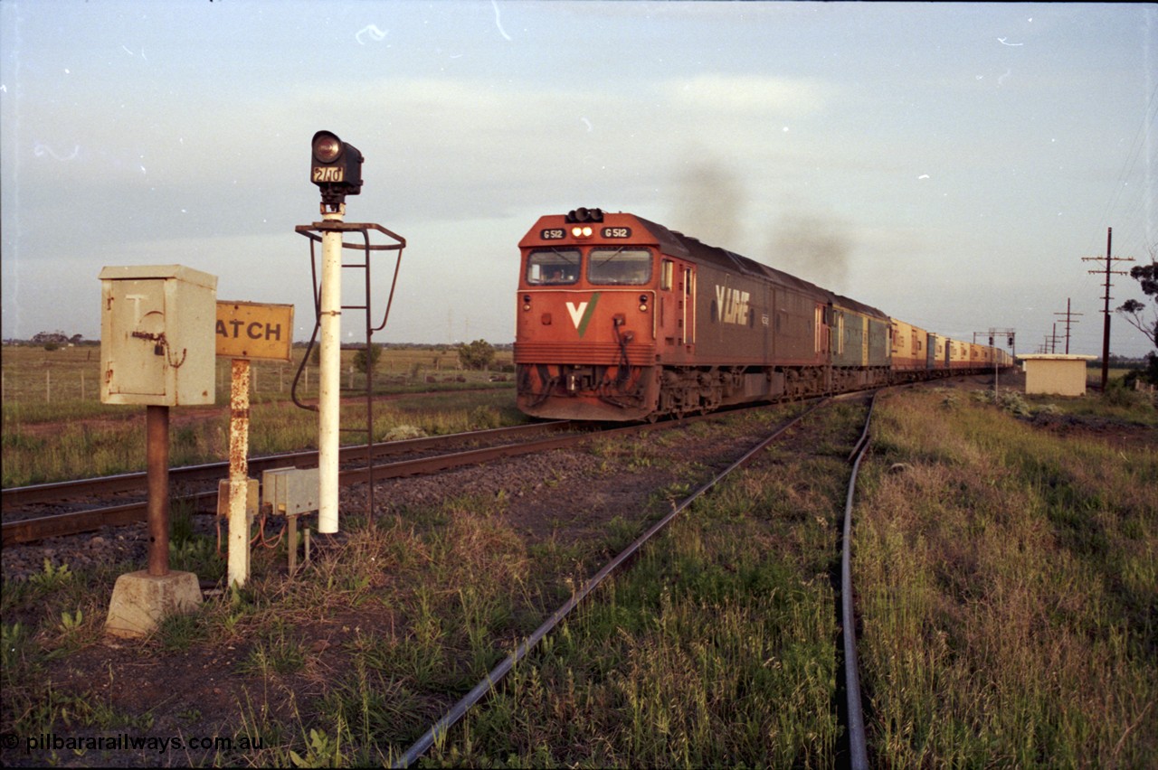 127-27
Deer Park West, broad gauge V/Line G class G 512 Clyde Engineering EMD model JT26C-2SS serial 84-1240 leads Australian National BL class BL 27 Clyde Engineering EMD model JT26C-2SS serial 83-1011 with a down Adelaide bound goods as they power away past the Boral junction on the main western line, train view, catch points
Keywords: G-class;G512;Clyde-Engineering-Rosewater-SA;EMD;JT26C-2SS;84-1240;