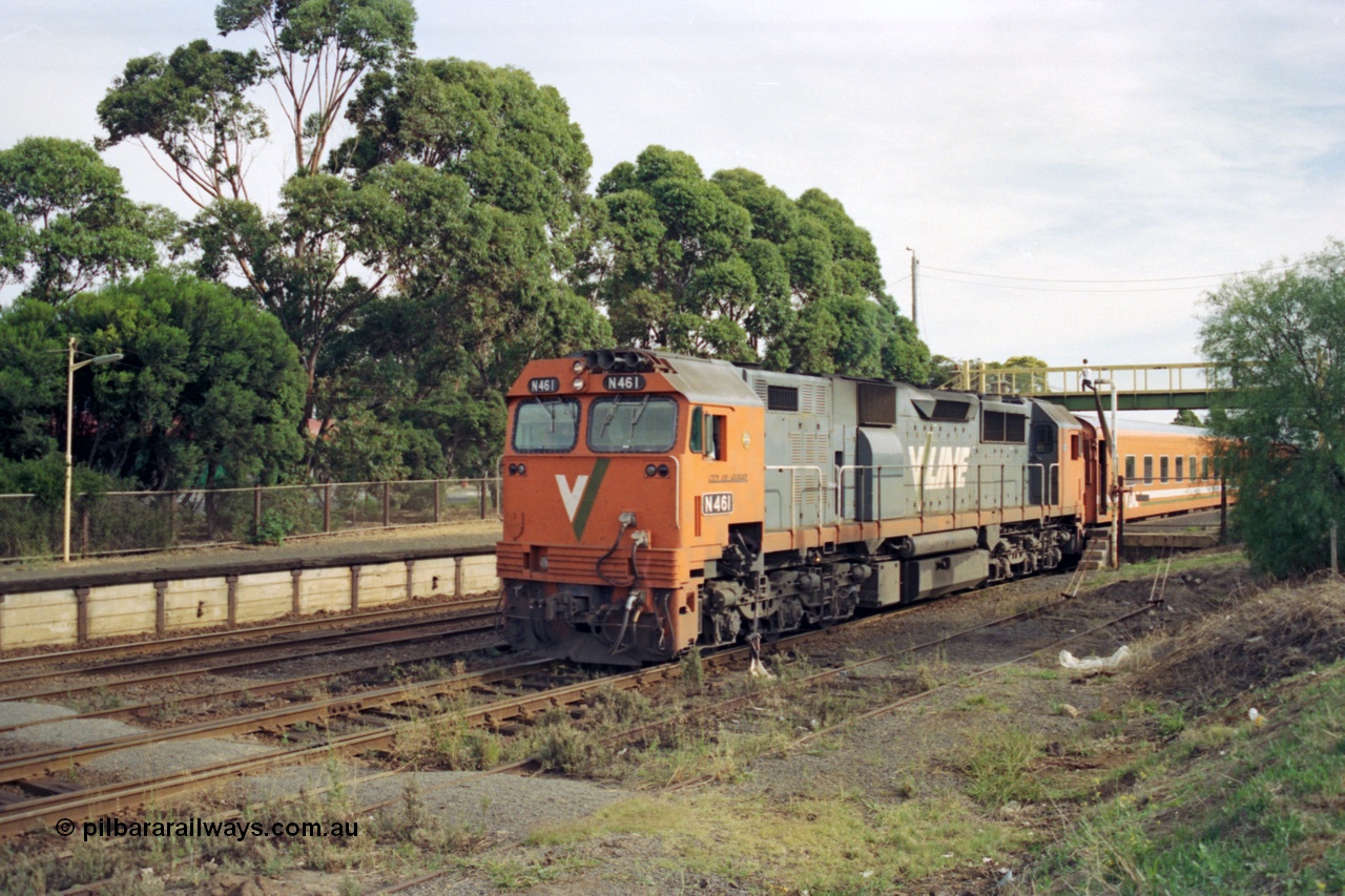 128-23
Sunbury, V/Line broad gauge N class N 461 'City of Ararat' Clyde Engineering EMD model JT22HC-2 serial 86-1190, N set, down passenger train departing, point lever and standpipe visible.
Keywords: N-class;N461;Clyde-Engineering-Somerton-Victoria;EMD;JT22HC-2;86-1190;