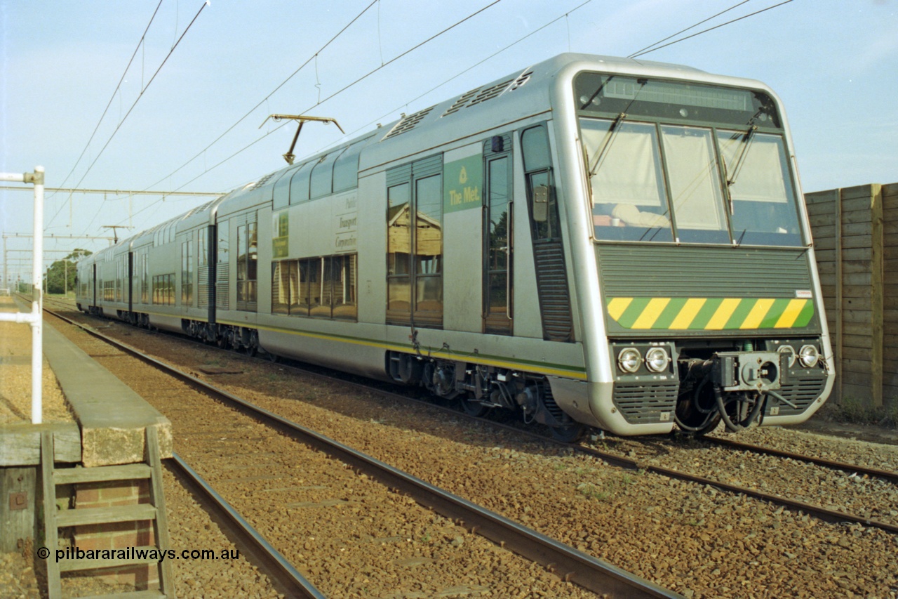 128-27
Nar Nar Goon, 4D (Double Deck Development and Demonstration), double deck suburban electric set, stabled during testing phase, 3/4 shot, station platform.
Keywords: 4D;Double-Deck-Development-Demonstration-train;Goninan-NSW;Tangara;