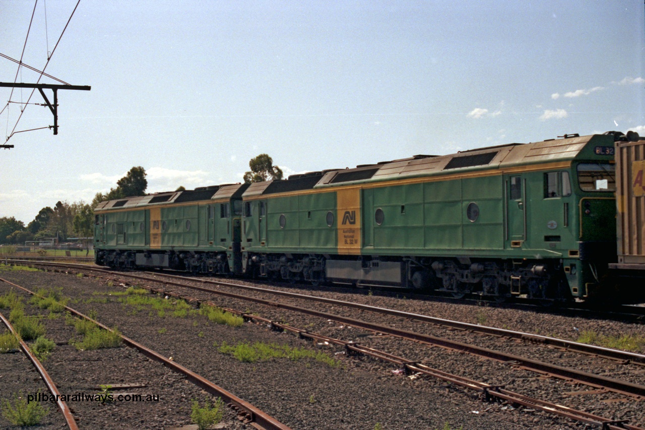 129-1-09
Sunshine, Australian National BL classes BL 33 Clyde Engineering EMD model JT26C-2SS serial 83-1017 and BL 32 serial 83-1016 in AN livery, lead a broad gauge down Adelaide goods train along No.2 Rd onto the South Line, point rodding, trailing view.
Keywords: BL-class;BL32;Clyde-Engineering-Rosewater-SA;EMD;JT26C-2SS;83-1016;