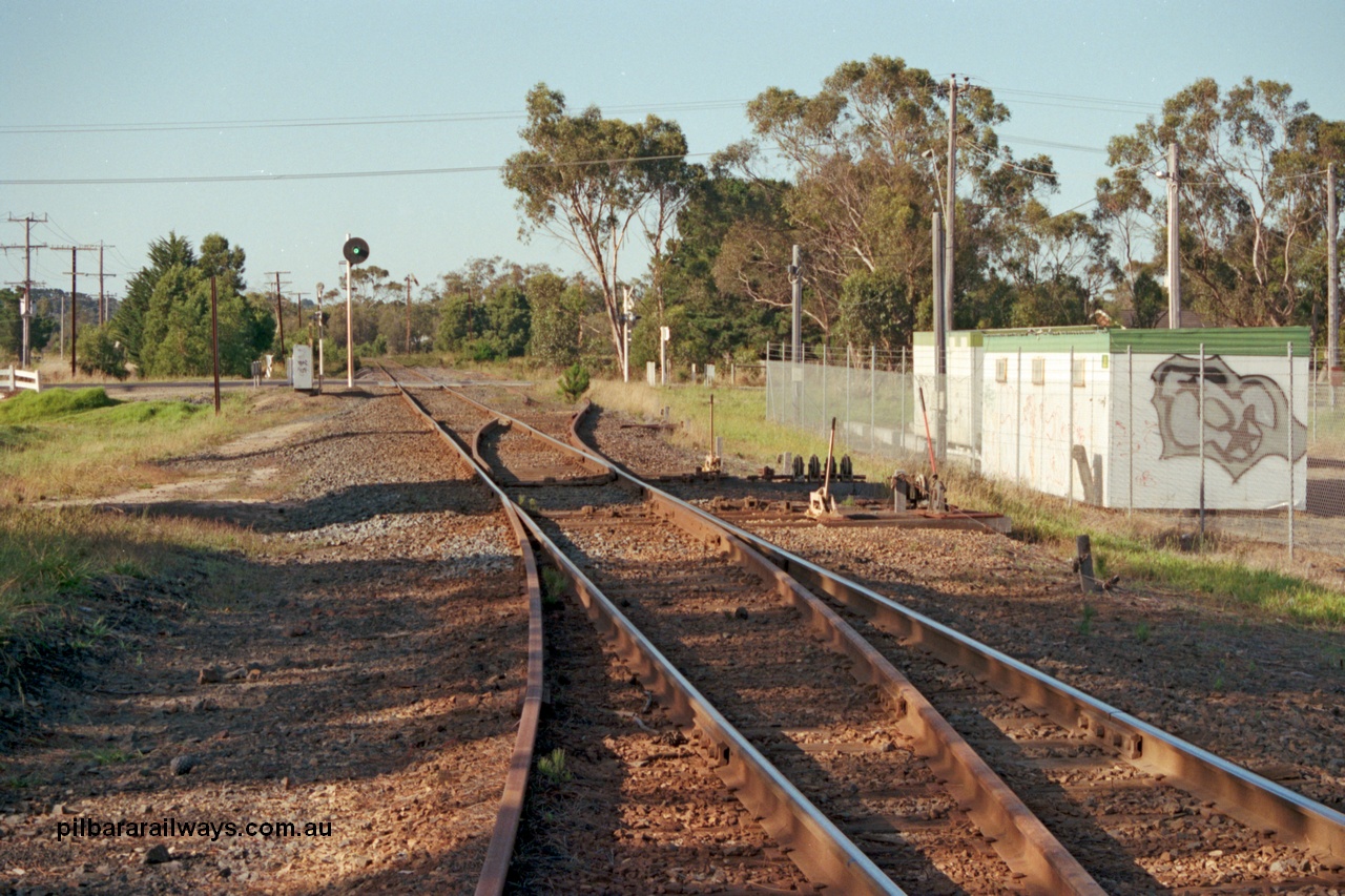 129-1-18
Baxter track view, ex Mornington junction, looking towards Somerville, points and point and signal levers with interlocking, searchlight signal post.
