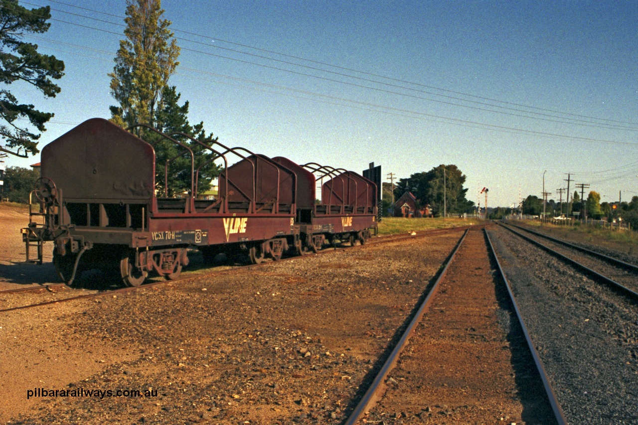 129-1-21
Somerville yard view, looking towards Melbourne, broad gauge V/Line VCSX type bogie coil steel waggons VCSX 70 and VCSX 39 both examples of second batch of sixty CSX type coil steel transport waggons constructed by Ballarat North Workshops to add to the original thirty built at Newport. CSX re-classed to VFSX in 1979 then to VCSX in 1987.
Keywords: CSX-type;VFSX-type;VCSX-type;Victorian-Railways-Ballarat-Nth-WS;VCSX70;VCSX39;