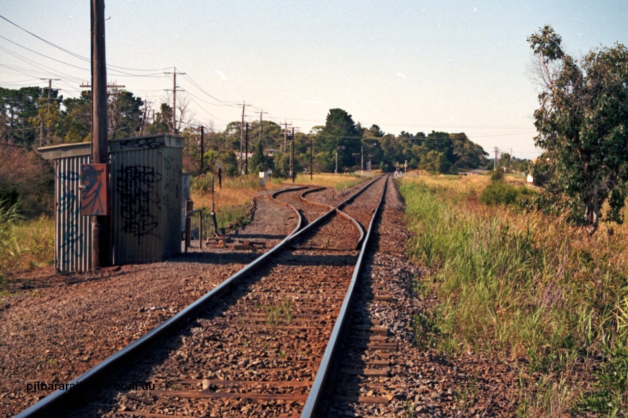129-1-24
Long Island Junction track view, looking east, staff exchange hut, points and point lever.
