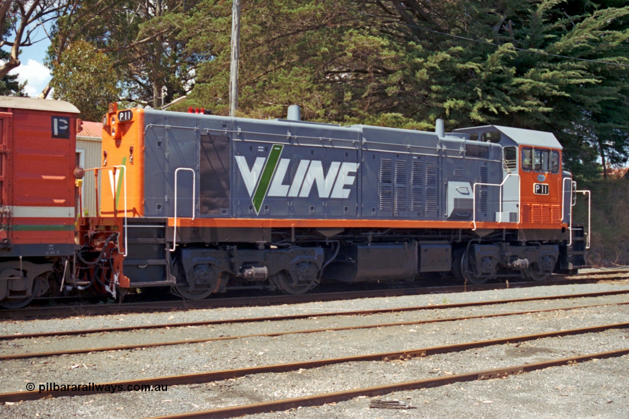 129-2-28
Leongatha V/Line P class P 11 Clyde Engineering EMD model G18HBR serial 84-1205 rebuilt from T 336 Clyde Engineering EMD model G8B serial 56-110, stabled pass.
Keywords: P-class;P11;Clyde-Engineering-Somerton-Victoria;EMD;G18HBR;84-1205;rebuild;