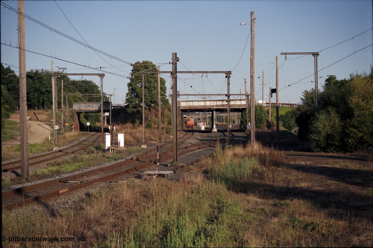 129-3-20
Warragul broad gauge V/Line up passenger train with N class N 461 'City of Ararat' Clyde Engineering EMD model JT22HC-2 serial 86-1190, track view, looking towards station, site of former A signal box, points and point lever, down line on the left.
