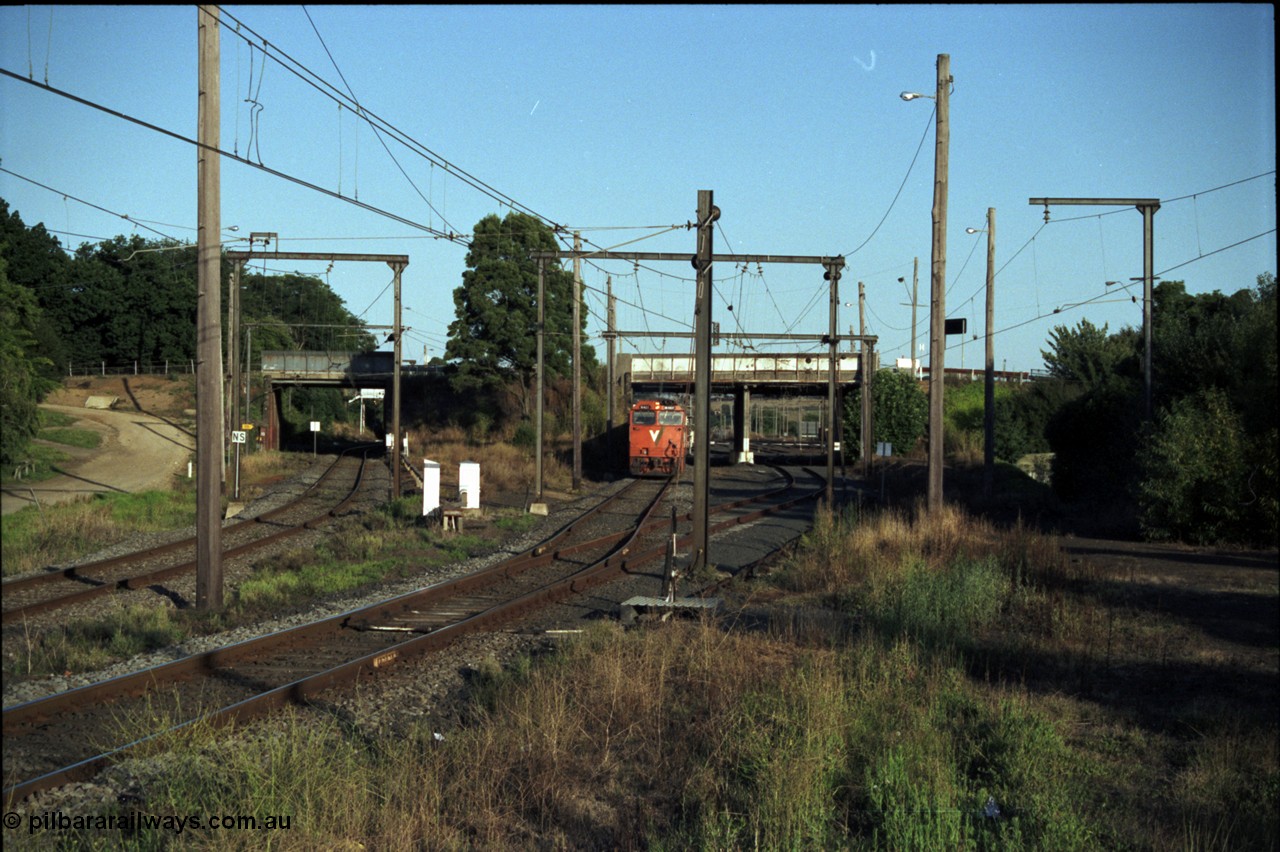129-3-21
Warragul broad gauge V/Line up passenger train with N class N 461 'City of Ararat' Clyde Engineering EMD model JT22HC-2 serial 86-1190, track view, looking towards station, site of former A signal box, points and point lever, down line on the left.
Keywords: N-class;N461;Clyde-Engineering-Somerton-Victoria;EMD;JT22HC-2;86-1190;