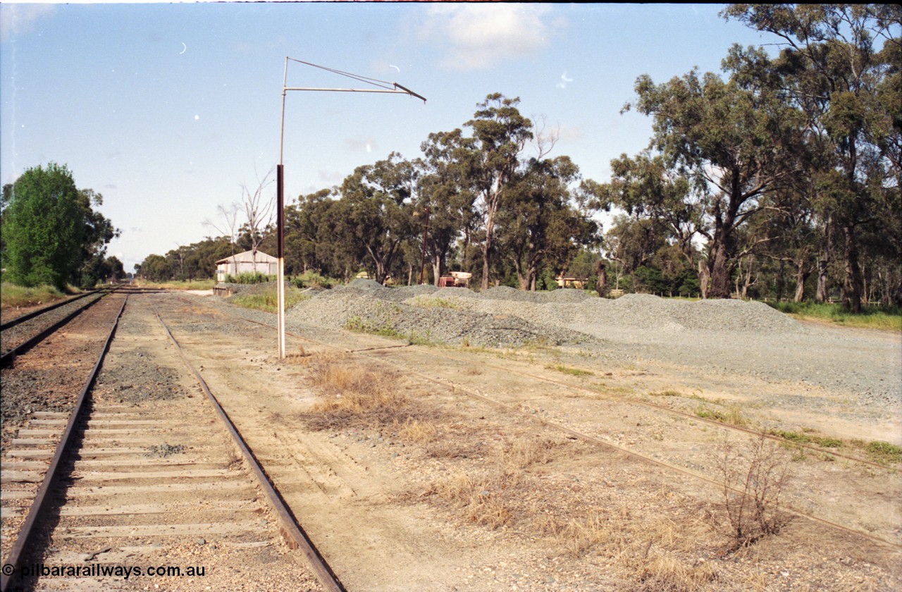 130-12
Rochester ballast pile and stand pipe, yard view, ballast loading site, looking south, old stock ramp area.
