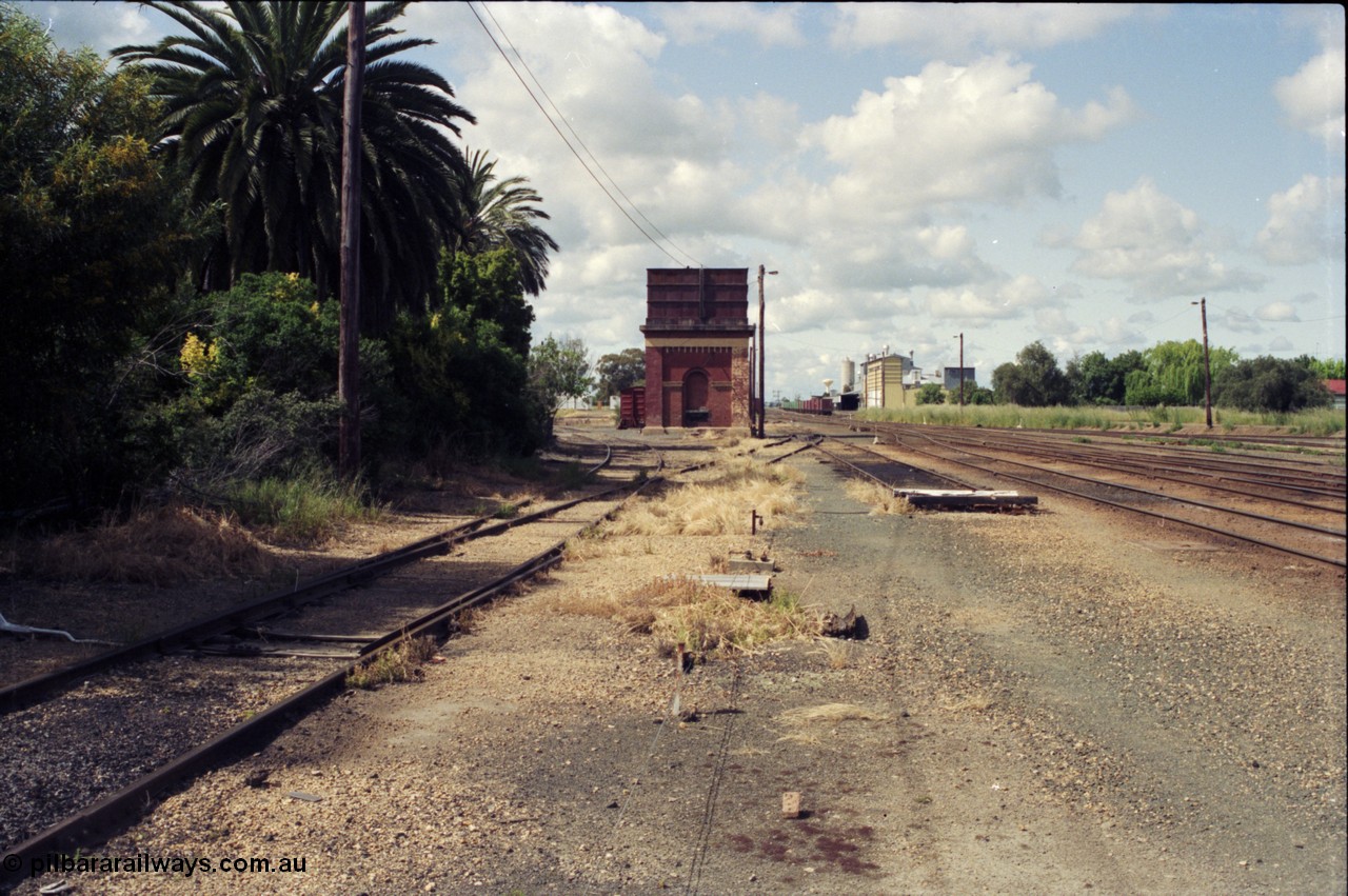 131-1-05
Echuca yard overview, looking south from dock area of station, water tower, track view.
