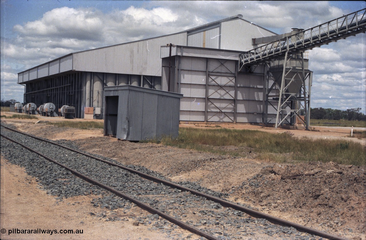 131-2-02
Burraboi rice storage complex, looking south from middle of yard, Mallee style staff shed.
