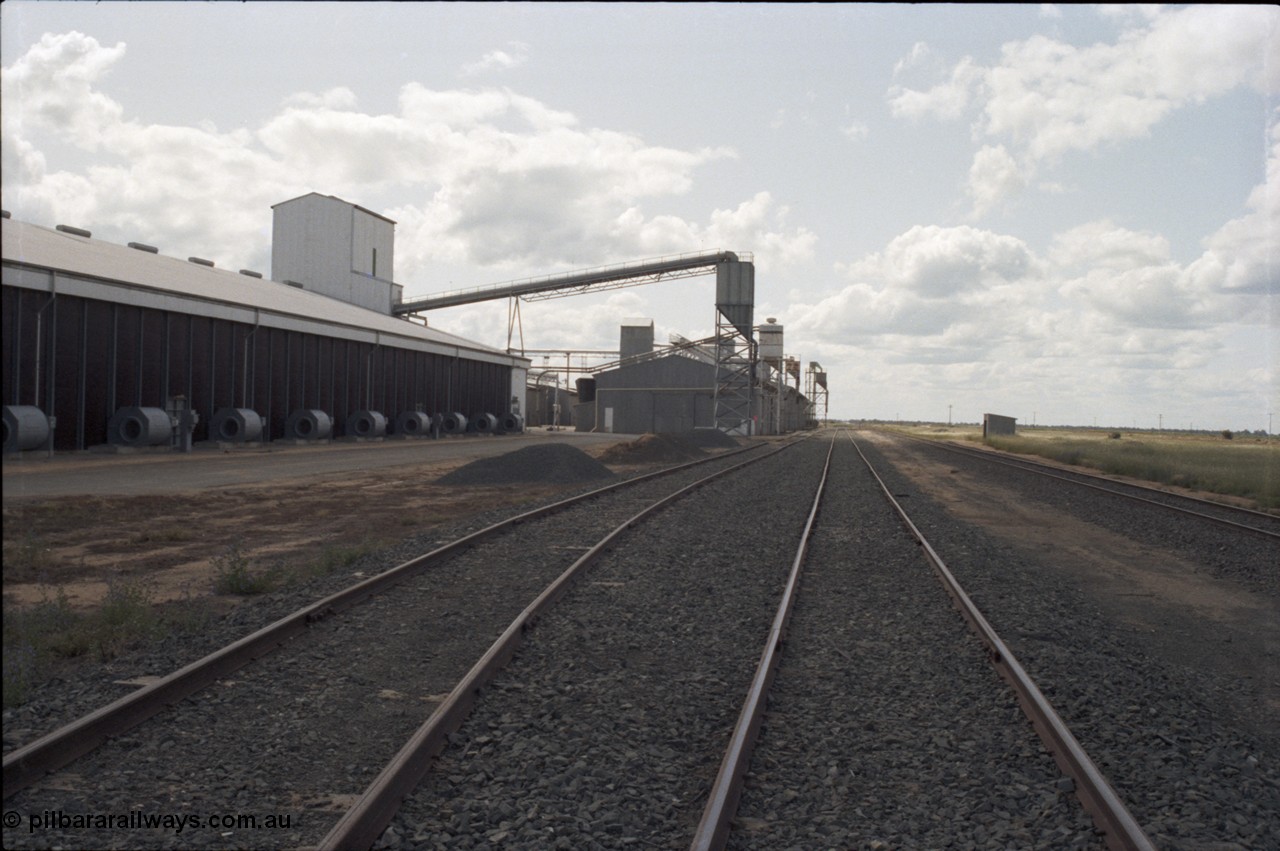 131-2-13
Caldwell rice storage complex, track view, Mallee style staff hut.
