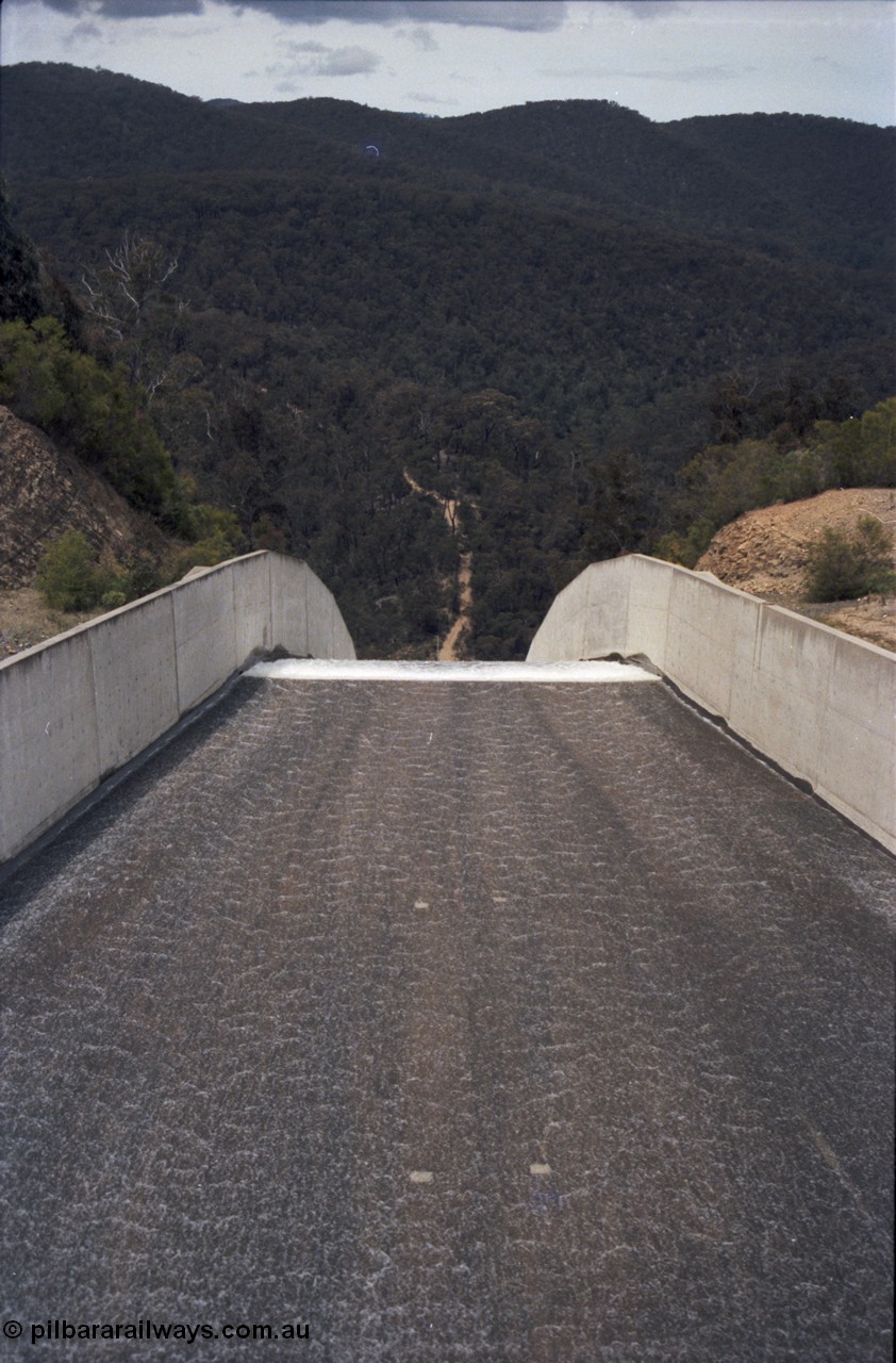 131-2-18
Thomson Dam overflowing, possibly 1992, looking down the spillway from the lookout area. [url=https://goo.gl/maps/o4ET1xcnqyr]GeoData[/url].

