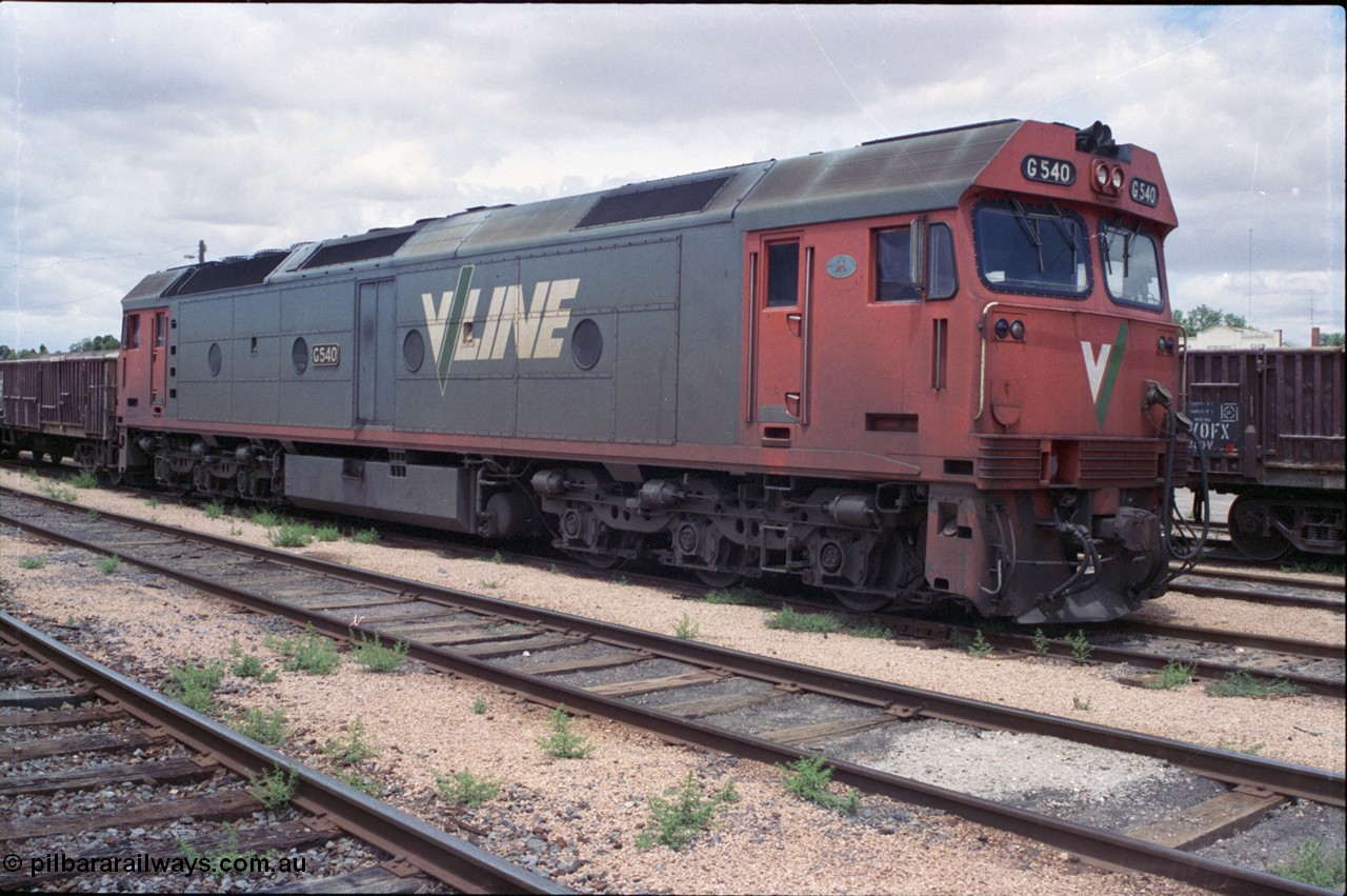 132-02
Ouyen broad gauge V/Line G class G 540 Clyde Engineering EMD model JT26C-2SS serial 89-1273, stabled up gypsum train 9138.
Keywords: G-class;G540;Clyde-Engineering-Somerton-Victoria;EMD;JT26C-2SS;89-1273;