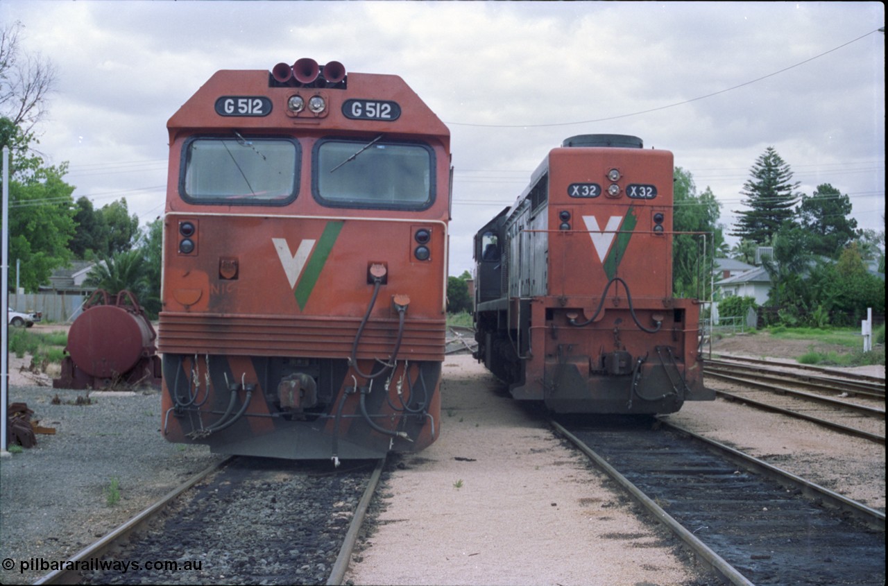 132-24
Mildura loco depot V/Line broad gauge X class X 32 Clyde Engineering EMD model G16C serial 66-485 and G class G 512 Clyde Engineering EMD model JT26C-2SS serial 84-1240, front view.
Keywords: G-class;G512;Clyde-Engineering-Rosewater-SA;EMD;JT26C-2SS;84-1240;X-class;X32;G16C;66-485;