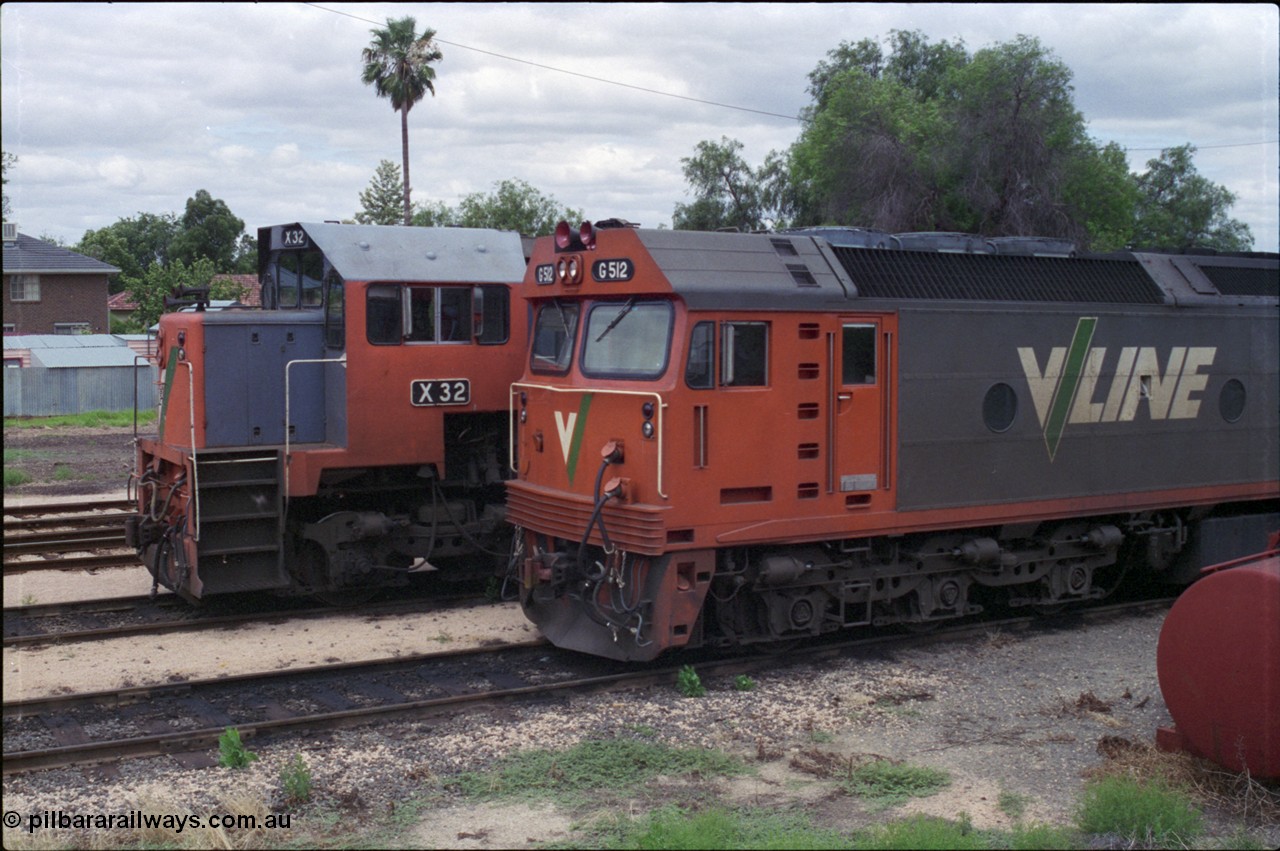 132-26
Mildura loco depot V/Line broad gauge X class X 32 Clyde Engineering EMD model G16C serial 66-485 and G class G 512 Clyde Engineering EMD model JT26C-2SS serial 84-1240, cab side view.
Keywords: G-class;G512;Clyde-Engineering-Rosewater-SA;EMD;JT26C-2SS;84-1240;X-class;X32;G16C;66-485;
