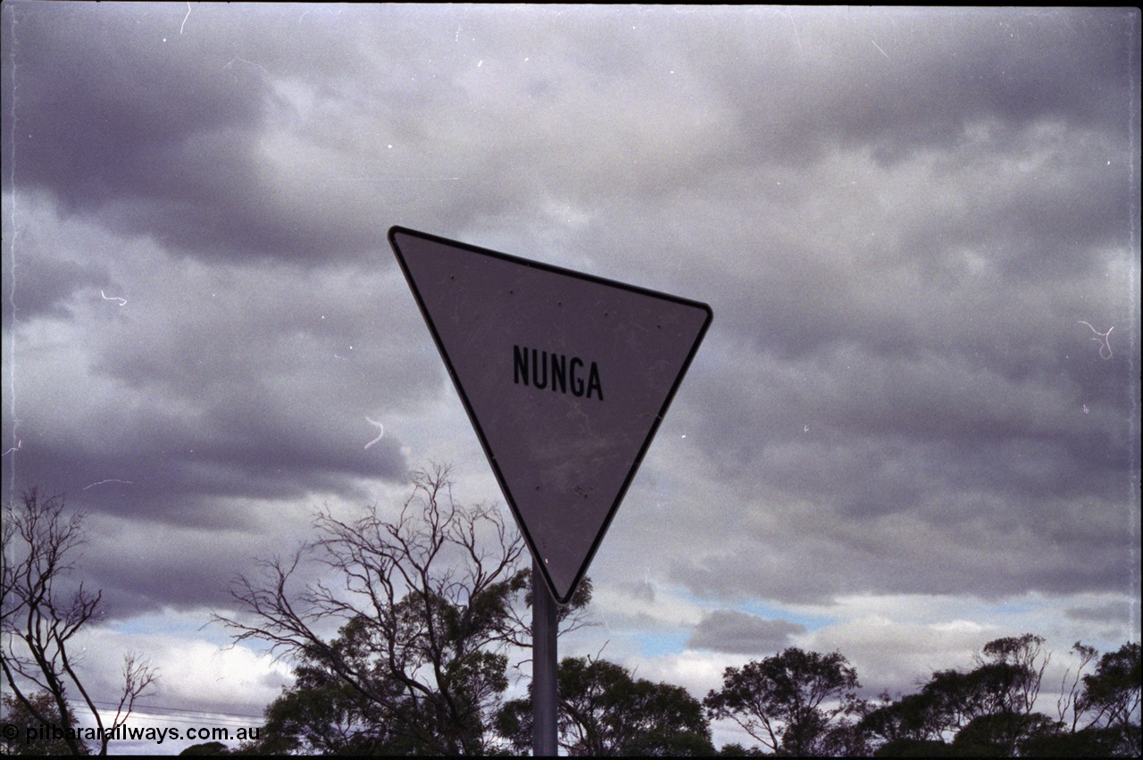 132-34
Nunga, location sign.
