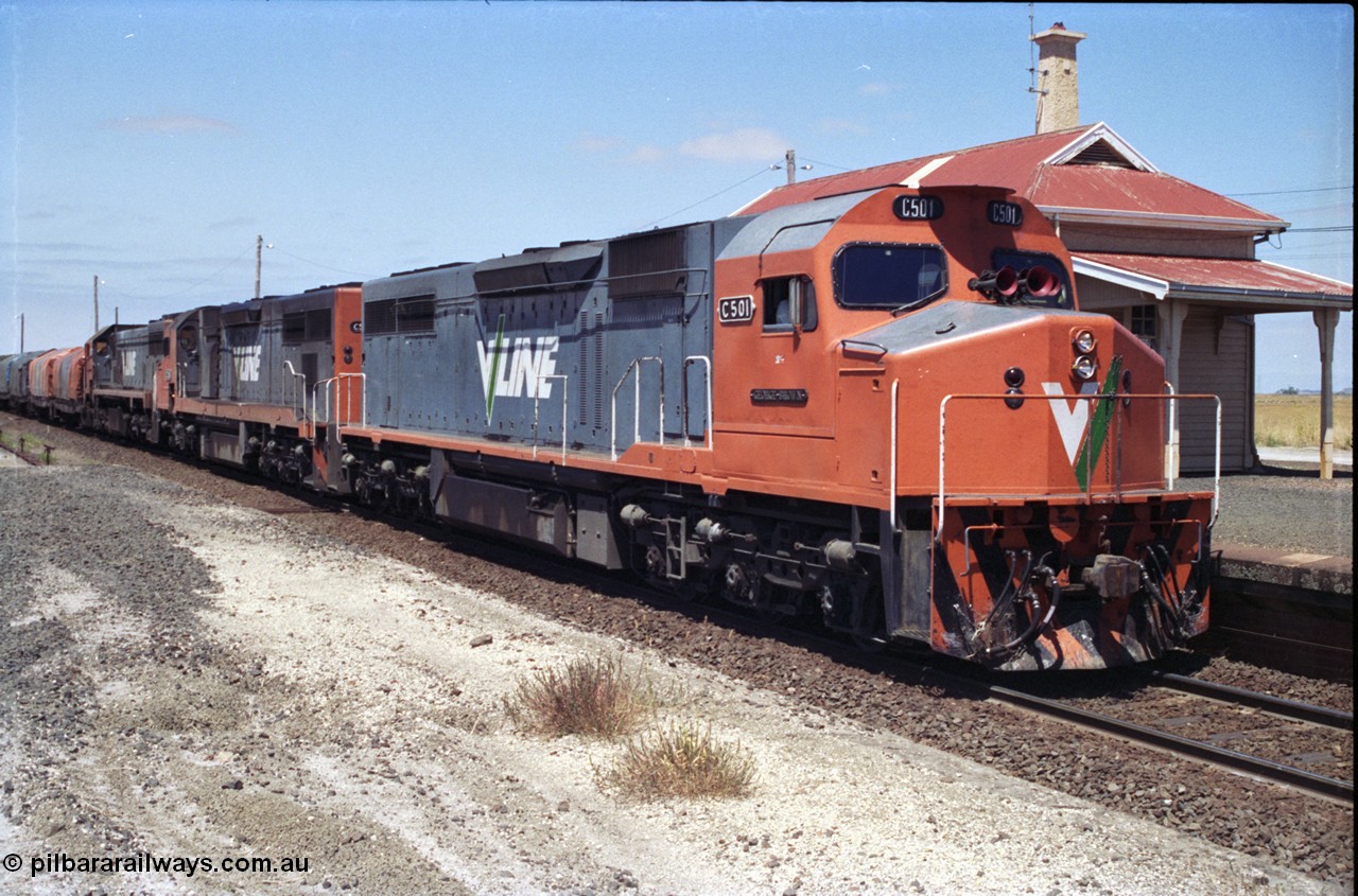 133-24
Gheringhap, V/Line broad gauge locos C class leader C 501 'George Brown' Clyde Engineering EMD model GT26C serial 76-824 leads C 506 serial 76-829 and X class X 45 'Edgar H Brownbill' Clyde Engineering EMD model G26C serial 75-792 with train 9169 down Adelaide goods, pausing for safeworking purposes.
Keywords: C-class;C501;Clyde-Engineering-Rosewater-SA;EMD;GT26C;76-824;