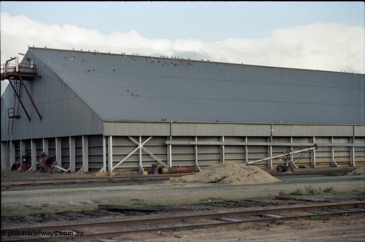 136-21
Deniliquin horizontal Victorian Oats Pool shed - grain bunker, part view.
