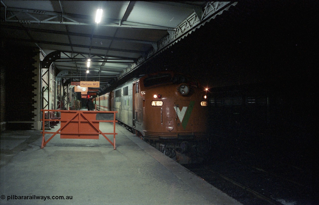 136-33
Seymour station platform view V/Line broad gauge A class A 62 Clyde Engineering EMD model AAT22C-2R serial 84-1183 rebuilt from B 62 Clyde Engineering EMD model ML2 serial ML2-3 waits to depart Seymour with the Sunday evening down pass to Cobram train 8345.
Keywords: A-class;A62;Clyde-Engineering-Rosewater-SA;EMD;AAT22C-2R;84-1183;rebuild;bulldog;