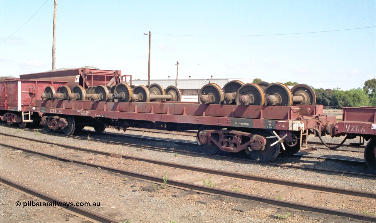 138-07
Bendigo yard, VZWA class bogie wheel set transporting waggon VZWA 7 loaded with wheel sets. Started life built new at Newport Workshops as E class bogie open waggon E 193 in July 1928, converted to S, back to E, then in 1980 converted to VOAA at Bendigo Workshops, then August 1984 converted to HR 7 (2nd) at Bendigo before reclassifying to VZWA.
Keywords: VZWA-type;VZWA7;E-type;E193;VOAA-type;VOZZ193;HD-type;HD7;