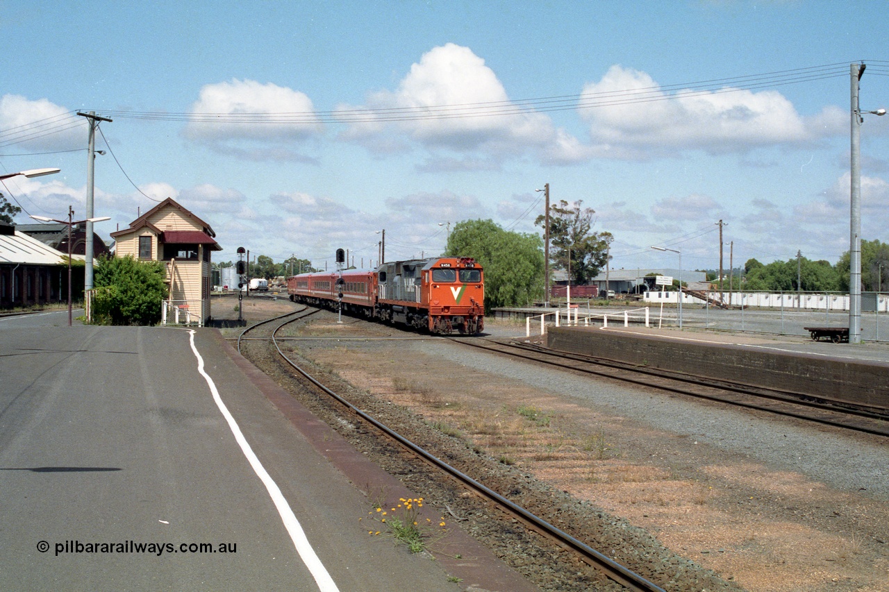138-12
Bendigo station overview looking south past Bendigo A box, V/Line broad gauge N class N 458 'City of Maryborough' Clyde Engineering EMD model JT22HC-2 serial 85-1226 arriving with N set on a down passenger service.
Keywords: N-class;N458;Clyde-Engineering-Somerton-Victoria;EMD;JT22HC-2;85-1226;
